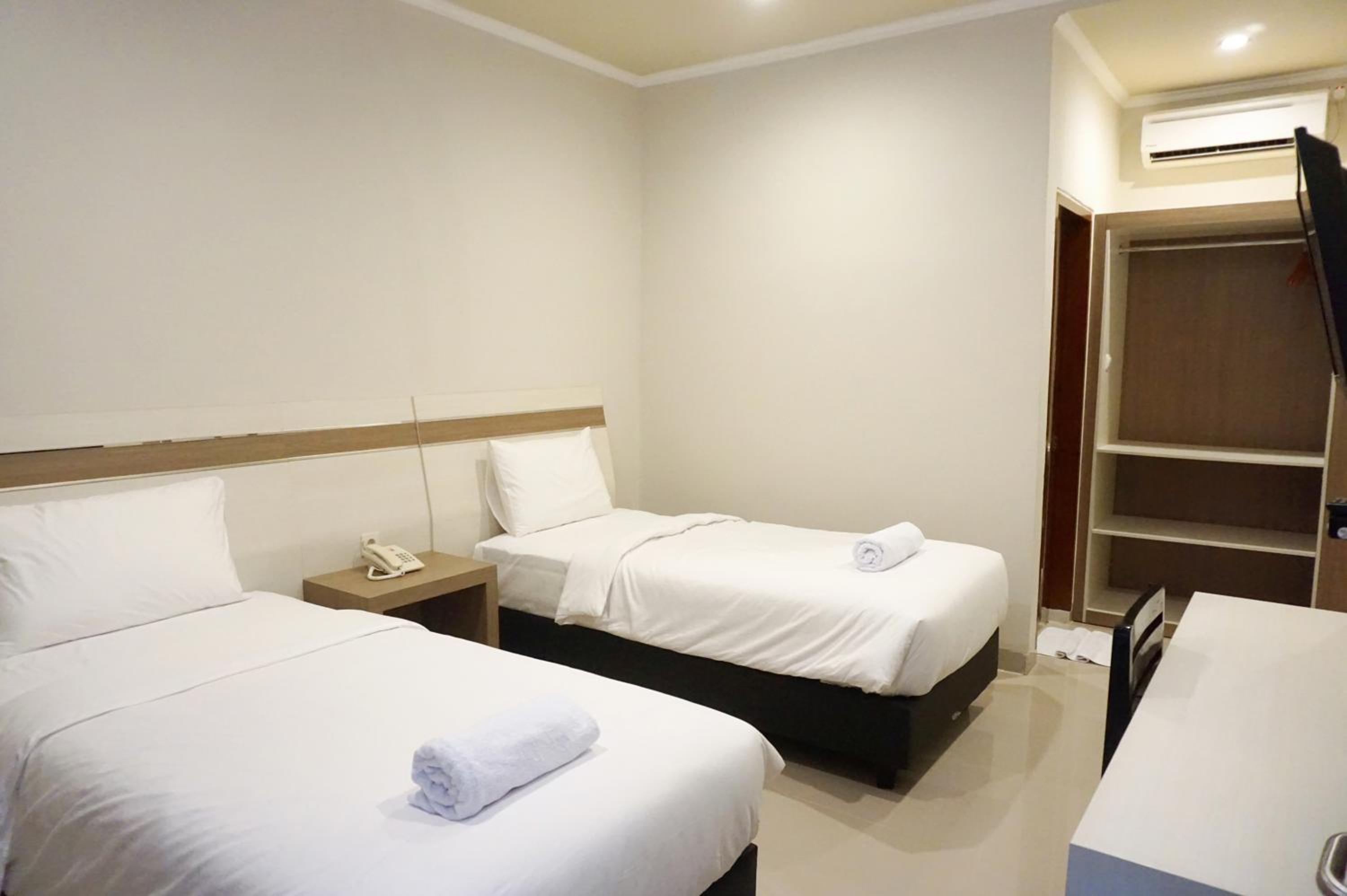 Deluxe Twin Room - Photo 9