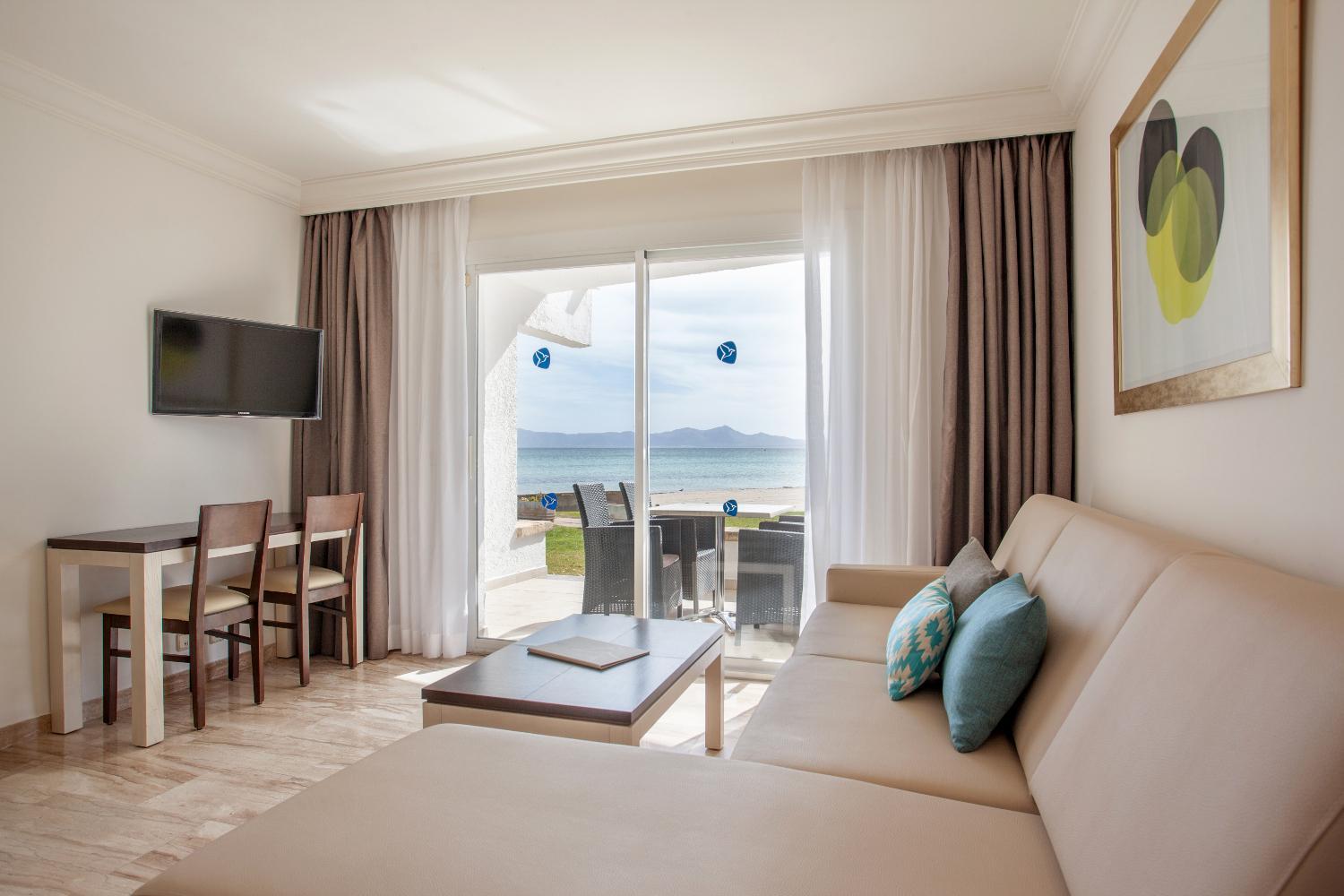 Apartamento de una habitación con vista lateral al mar (2 adultos + 2 niños)