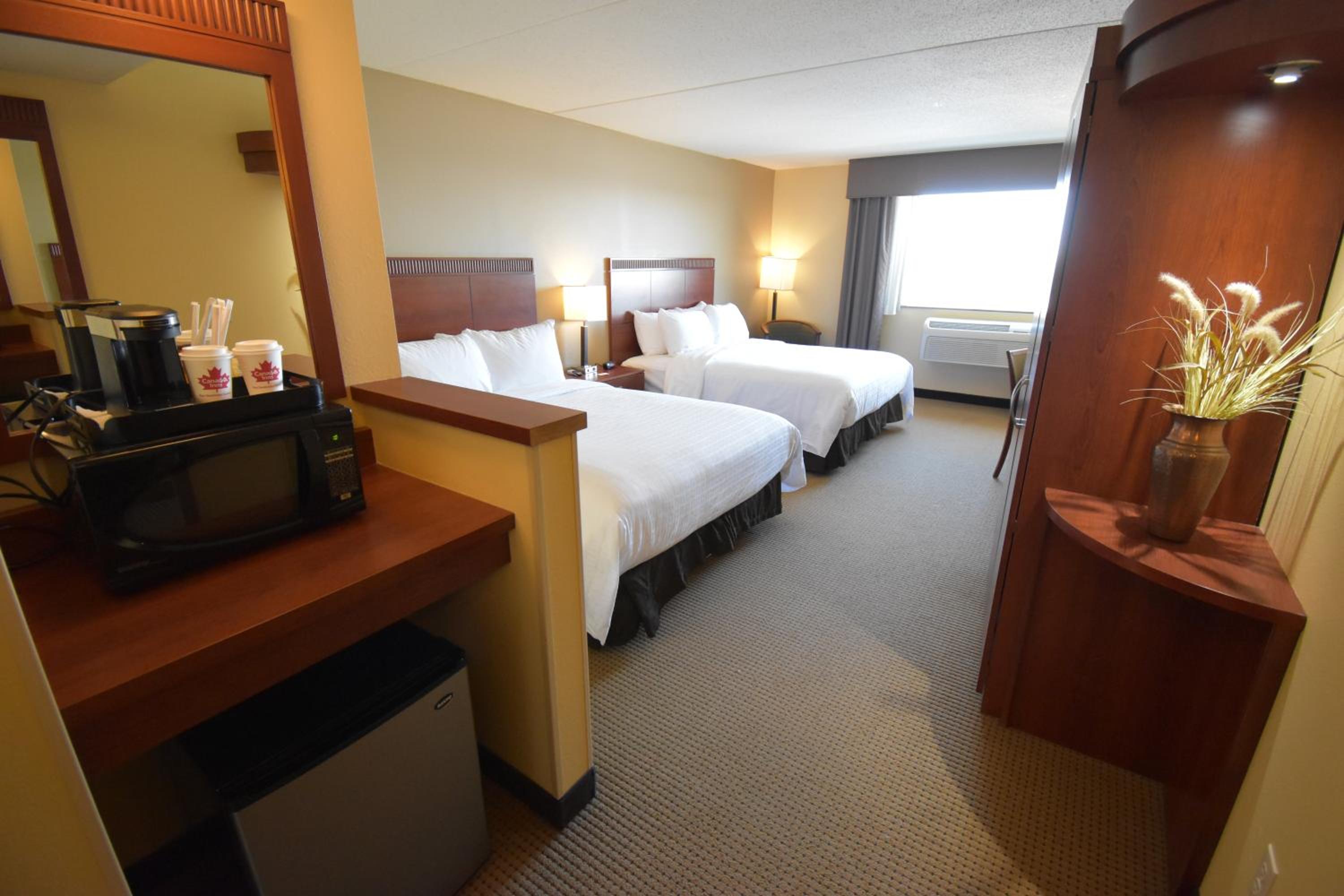 Queen Room with Two Queen Beds - Photo 1