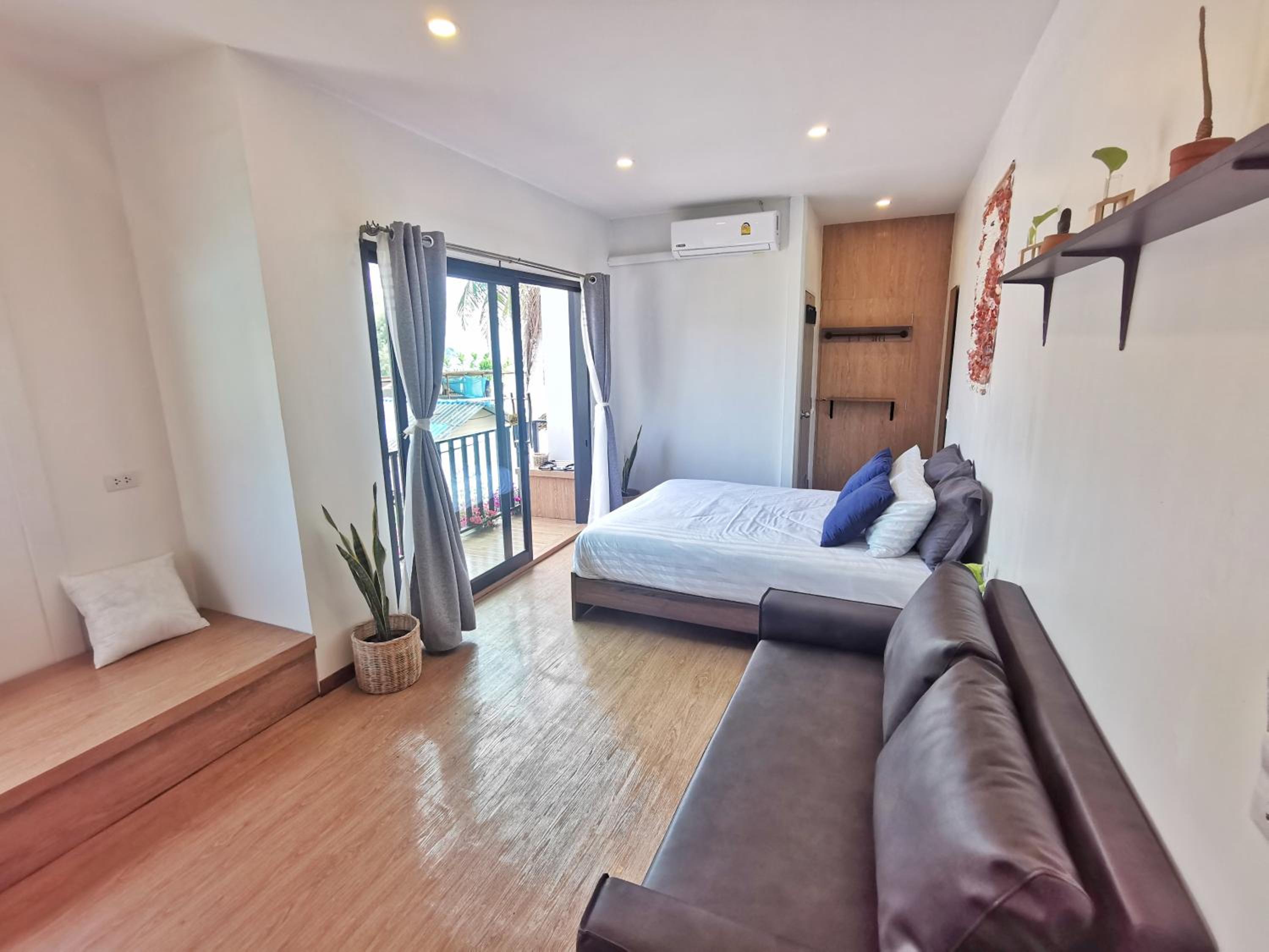 Three-Bedroom House - Photo 76