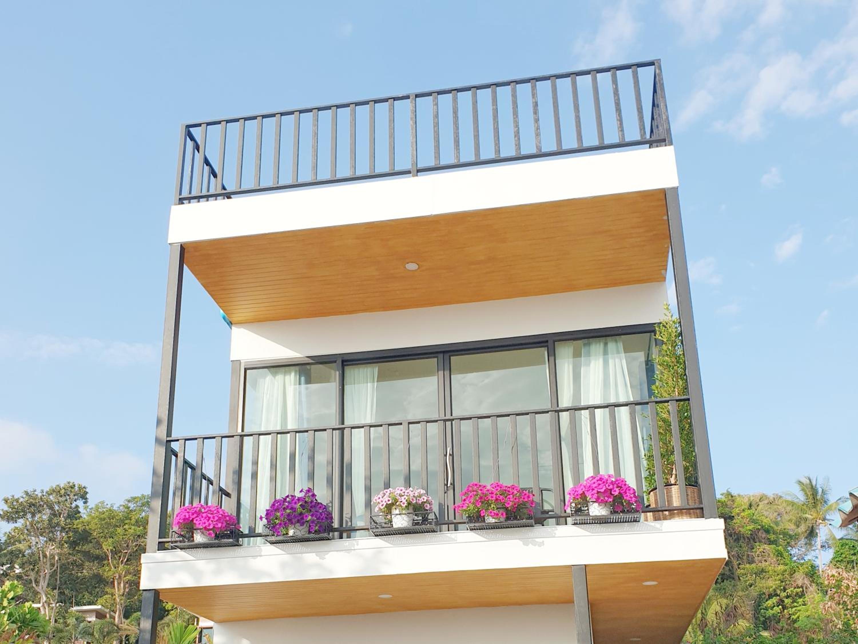 Three-Bedroom House - Photo 67