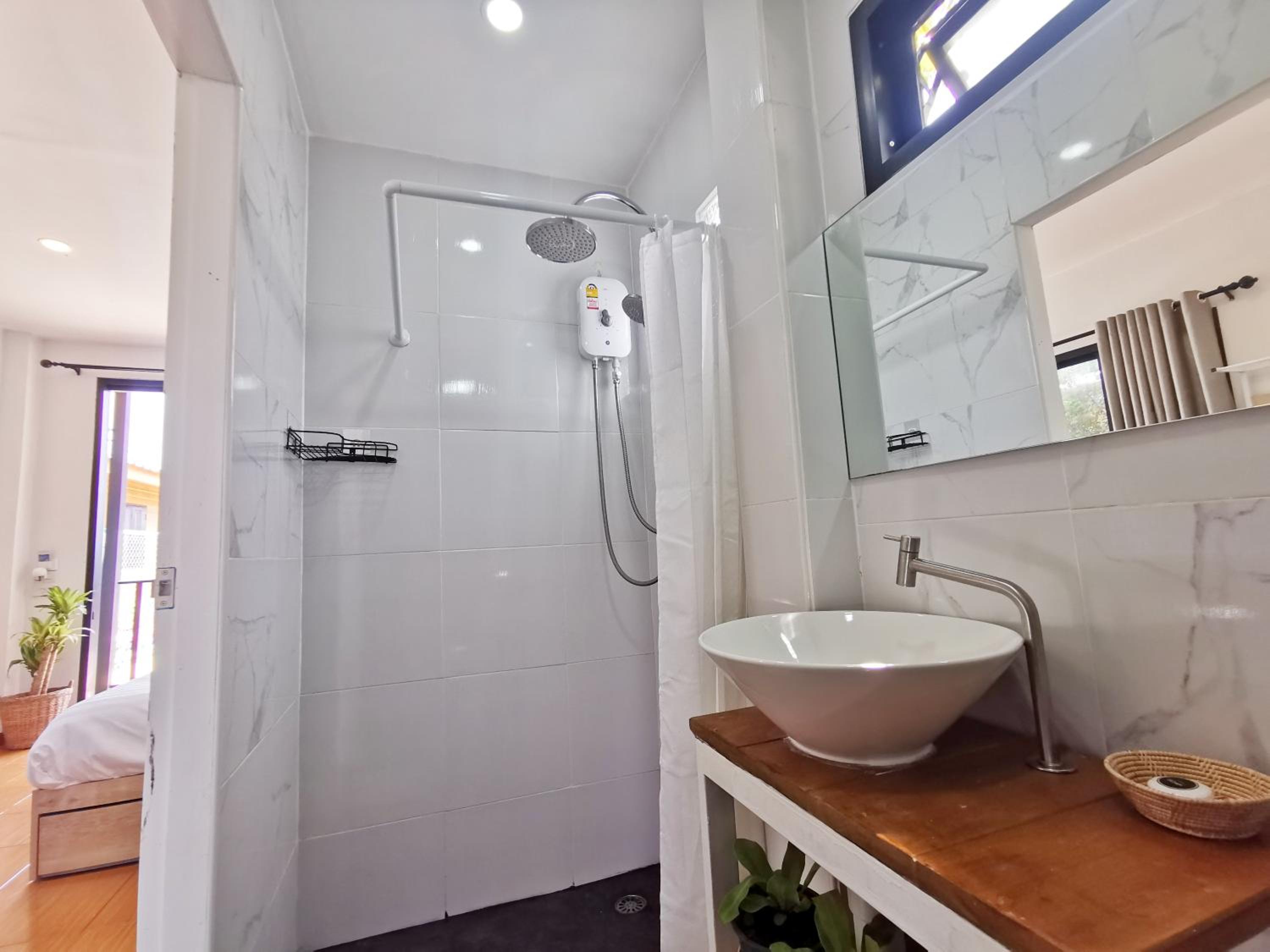Three-Bedroom House - Photo 64