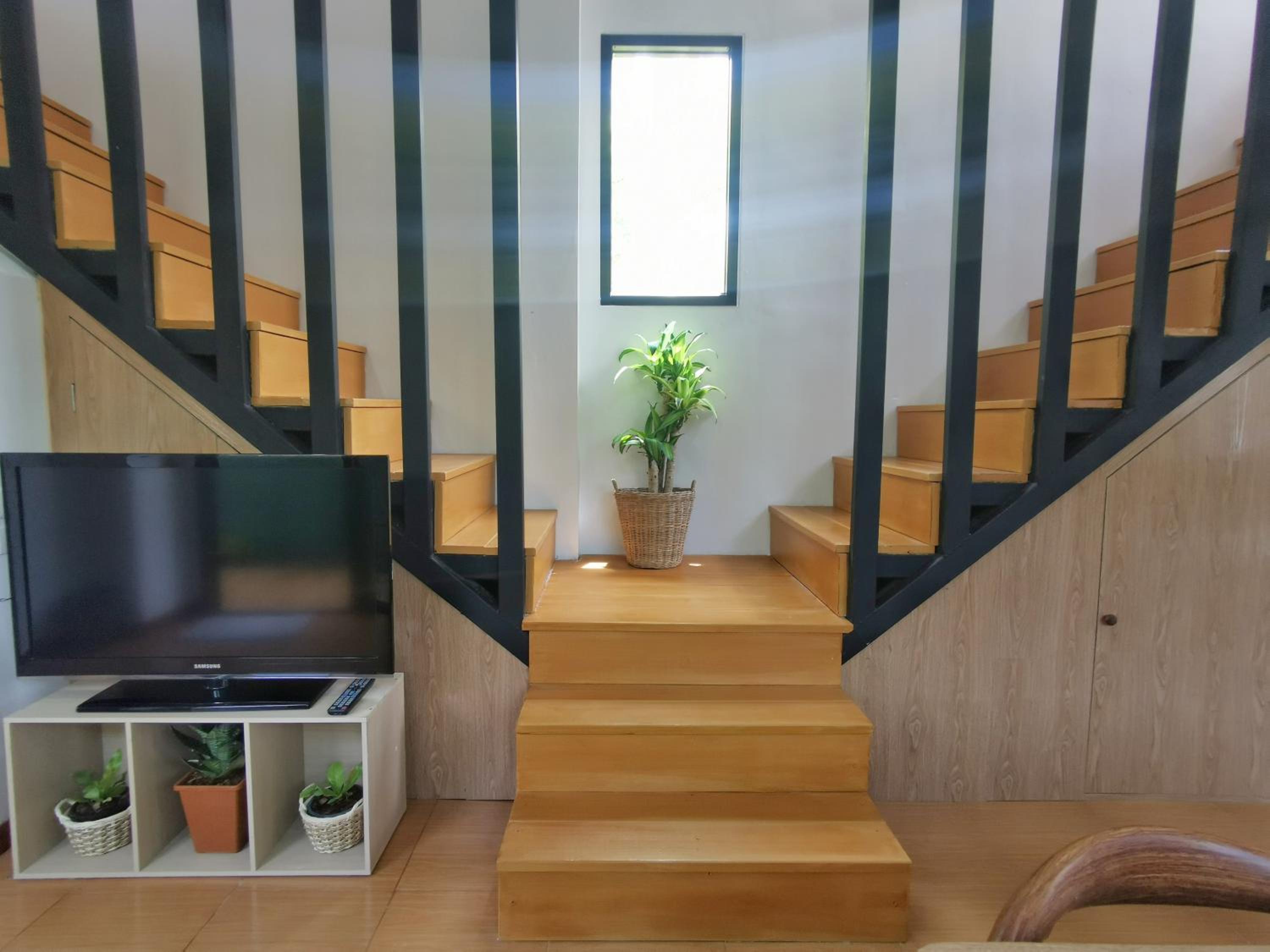 Three-Bedroom House - Photo 59