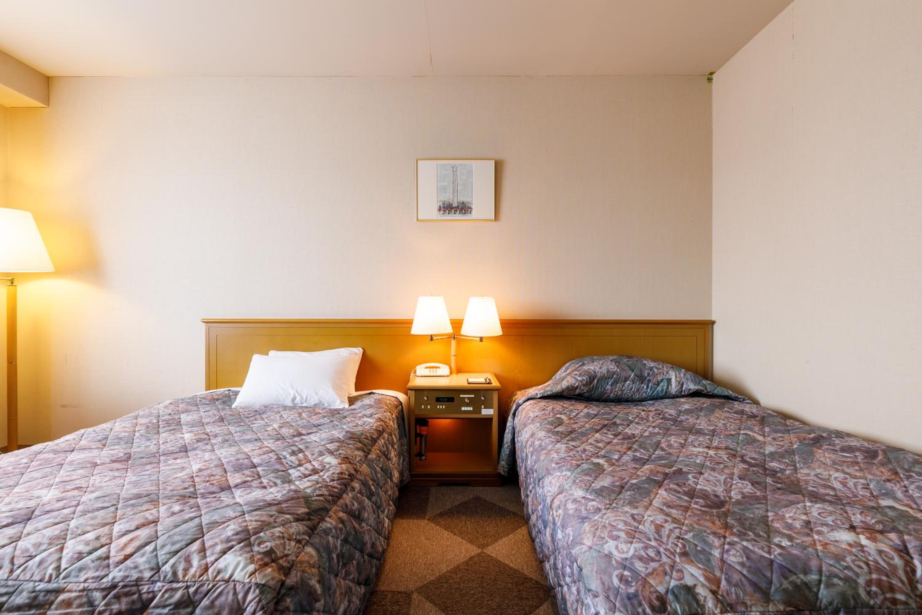 Twin Room - Non-Smoking - Photo 11