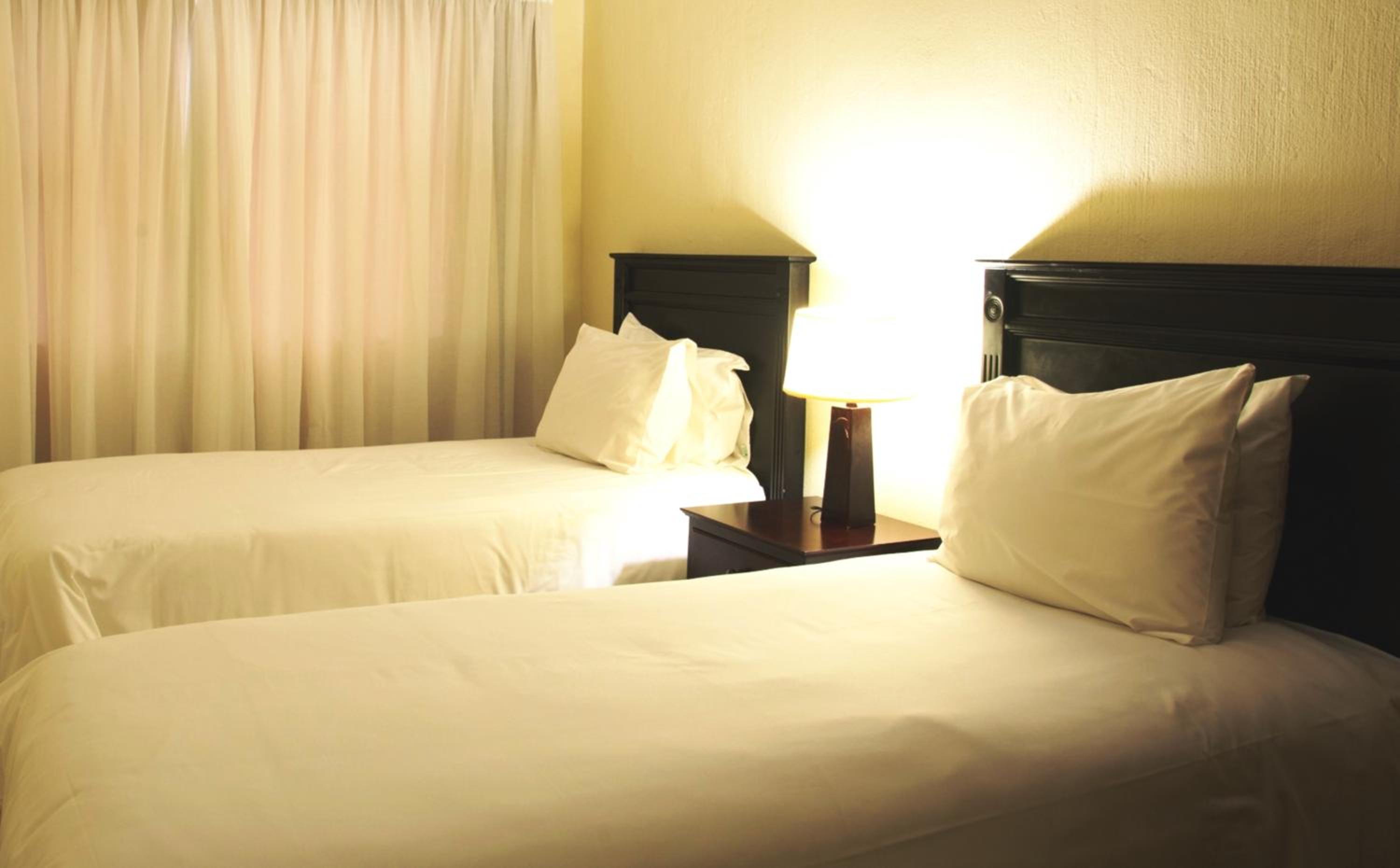Two-Bedroom Apartment with Double Bed and Twin Beds