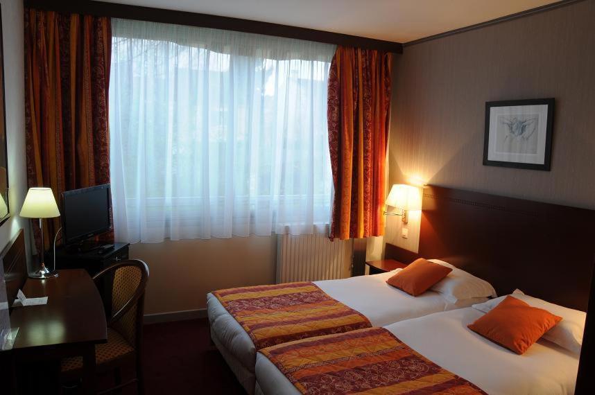Twin Room - Photo 1