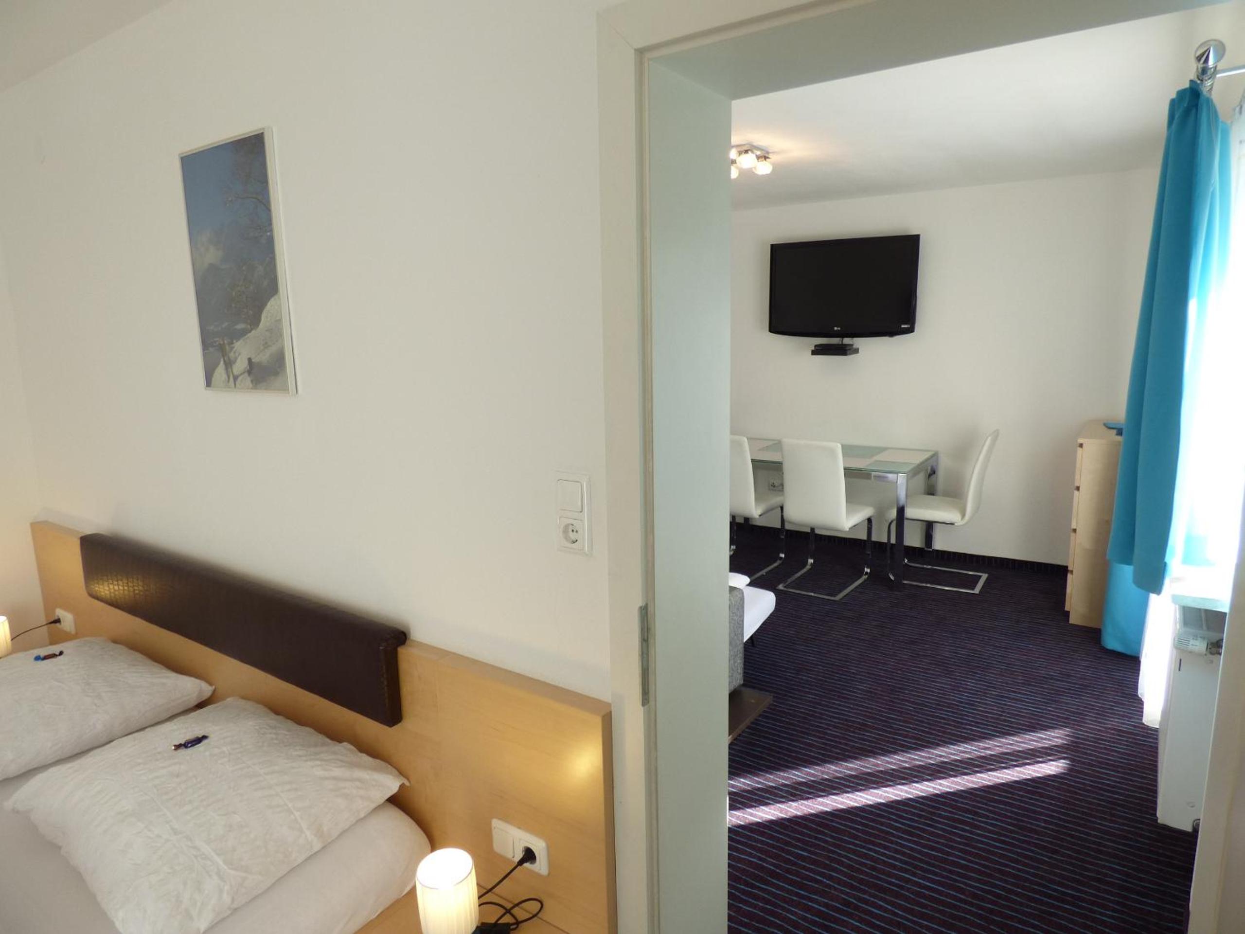 Family Suite with Balcony (2 Adults + 2 Children) photo 2