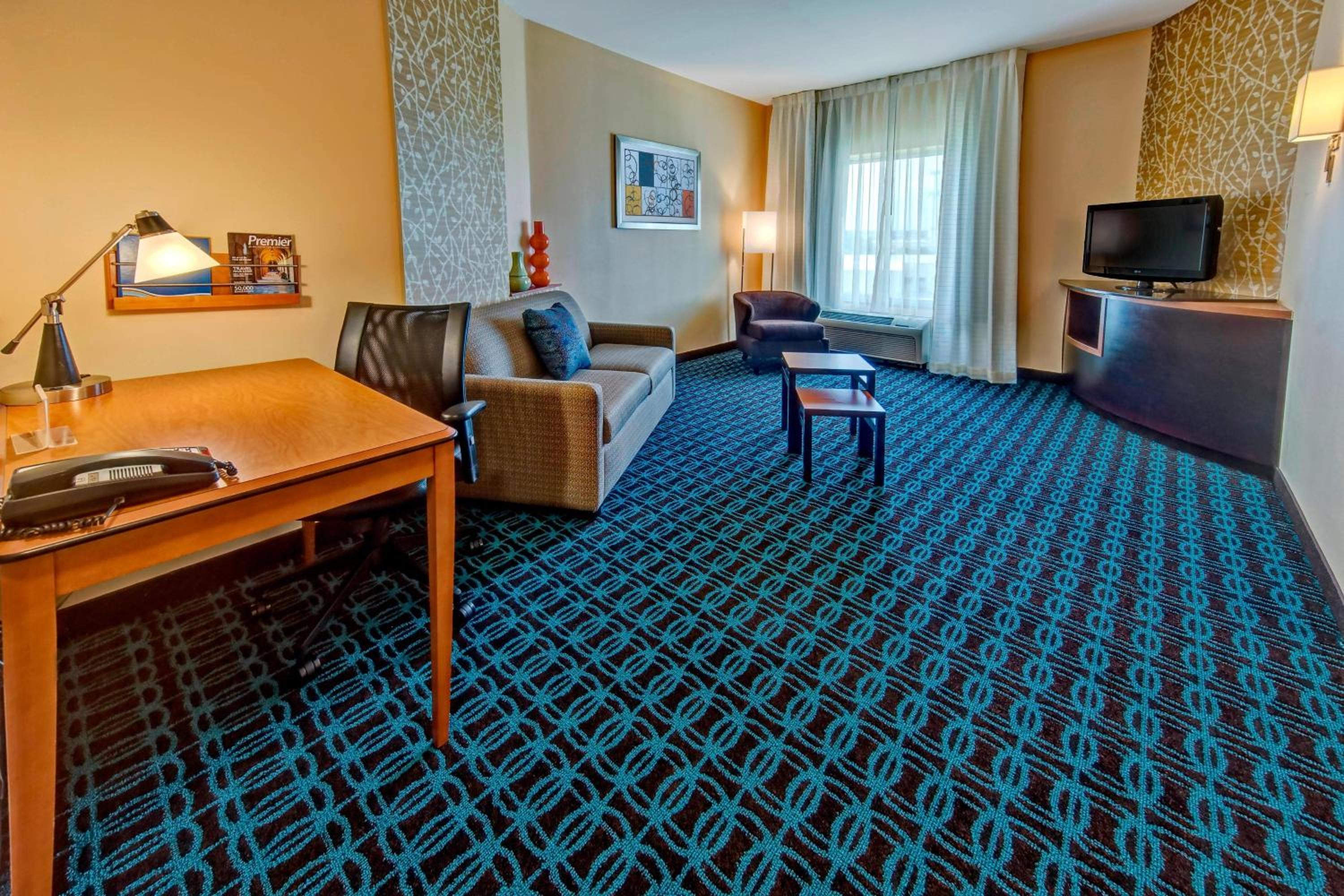 One-Bedroom King Suite with Roll-In Shower and Sofa Bed - Mobility Access/Hearing Accessible