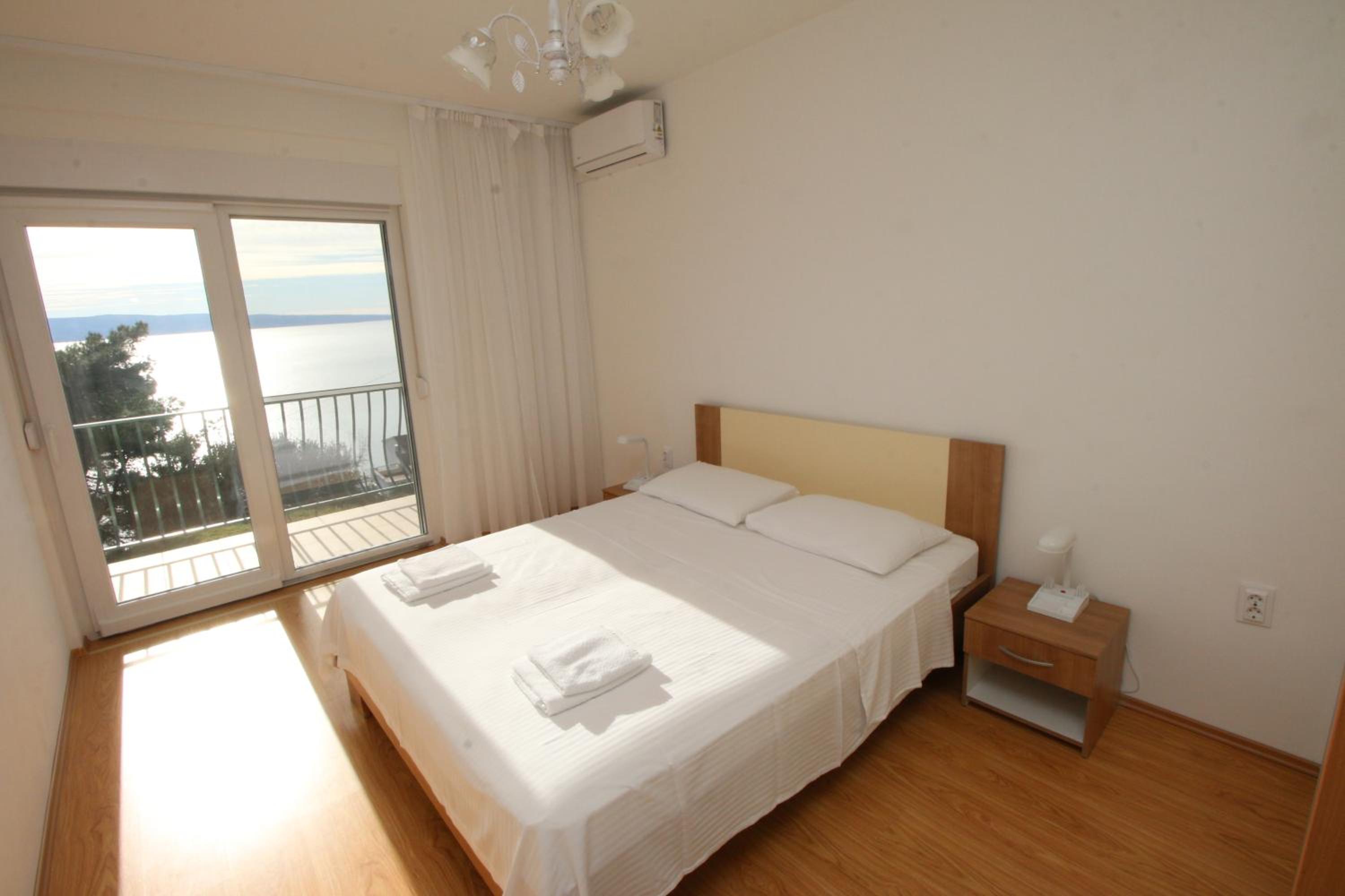 Two-Bedroom Apartment with Balcony and Sea View