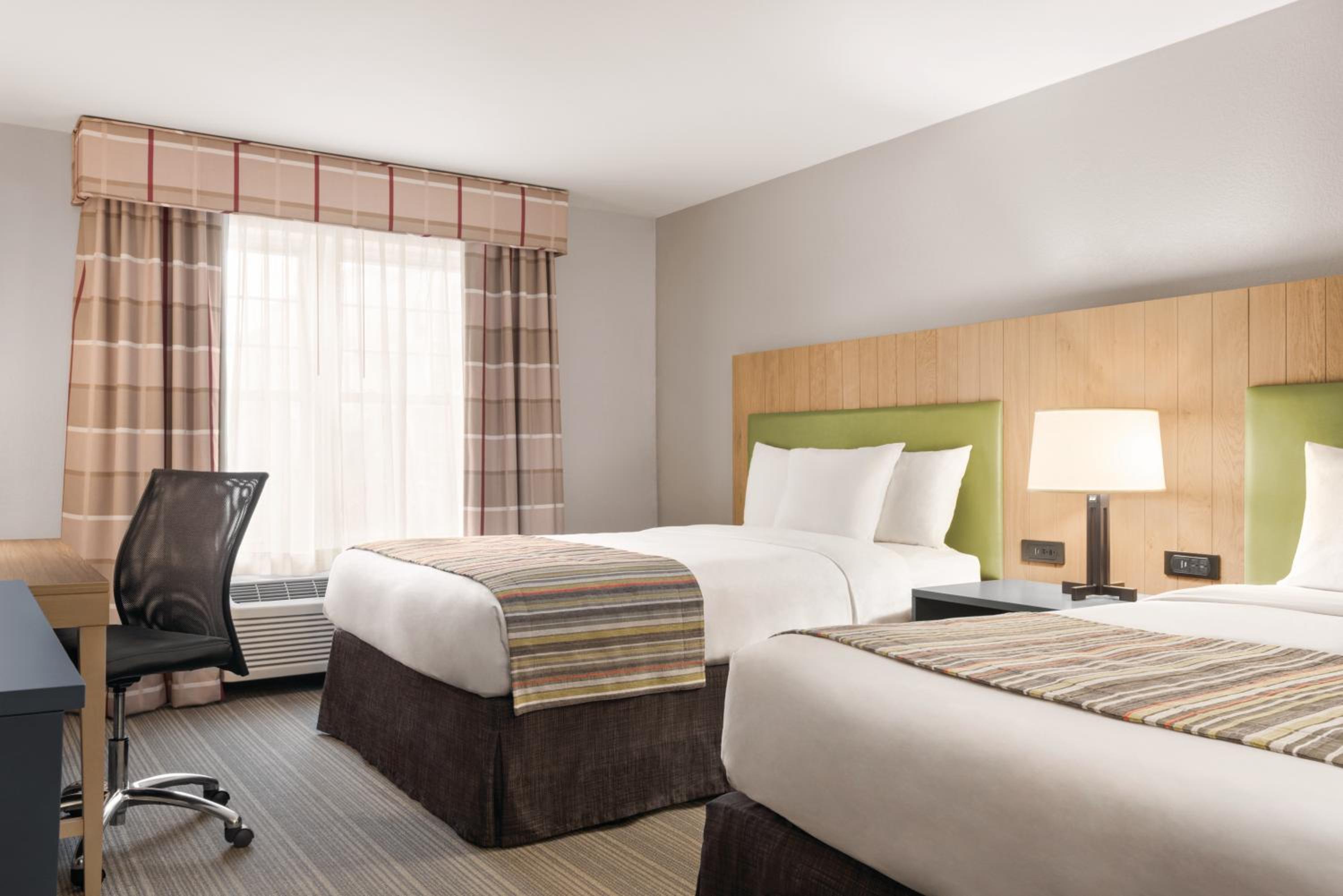Queen Room with Two Queen Beds - Photo 1