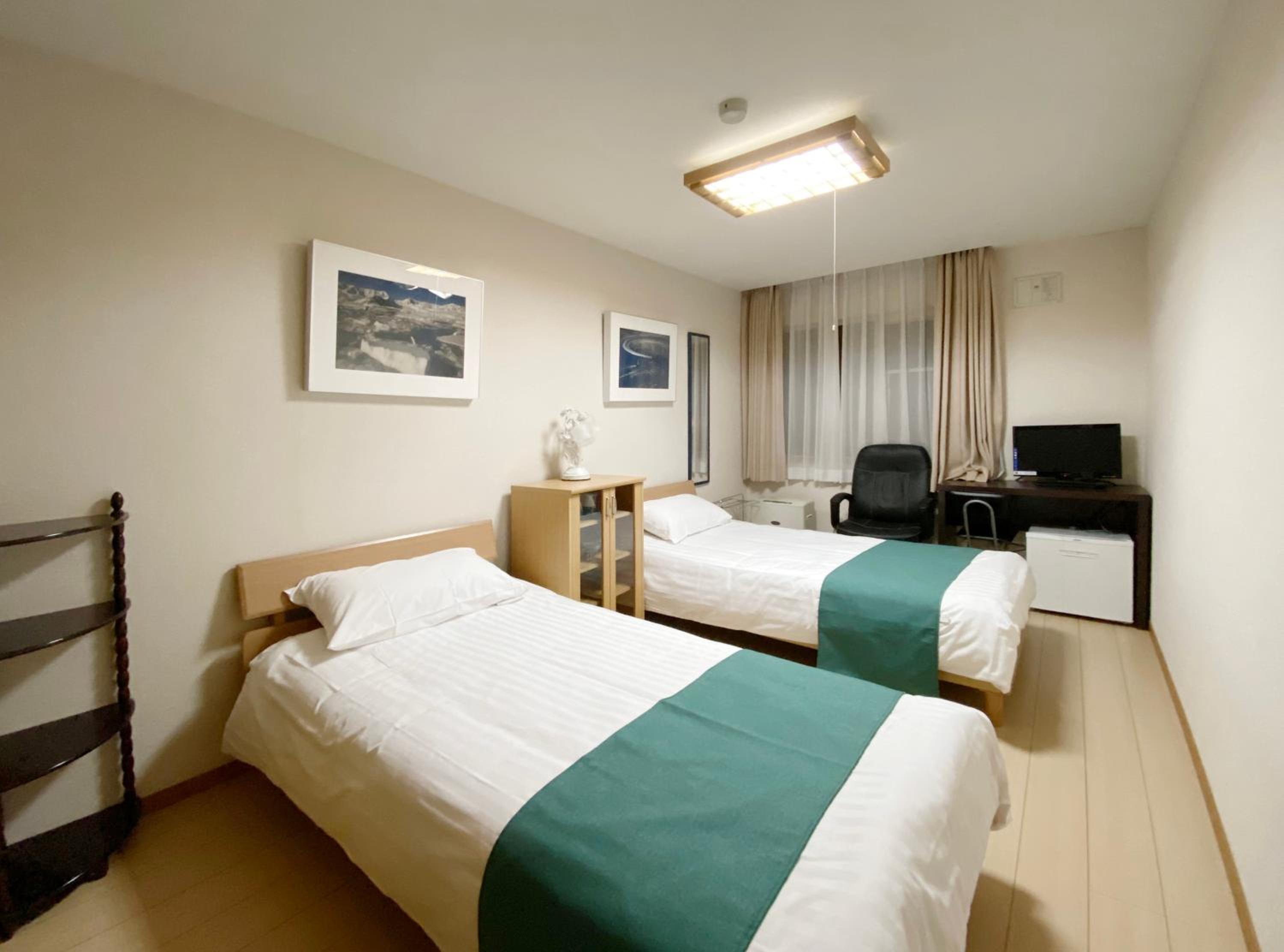 Twin Room With Shared Toilet photo 1