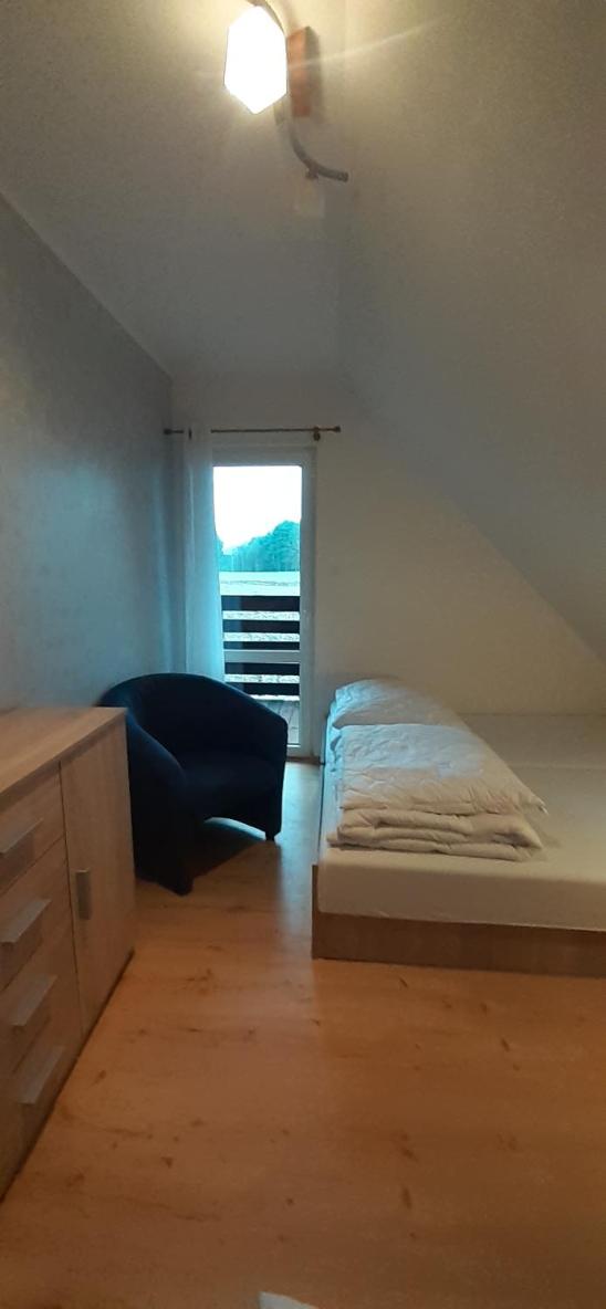 Three-Bedroom House - Photo 23