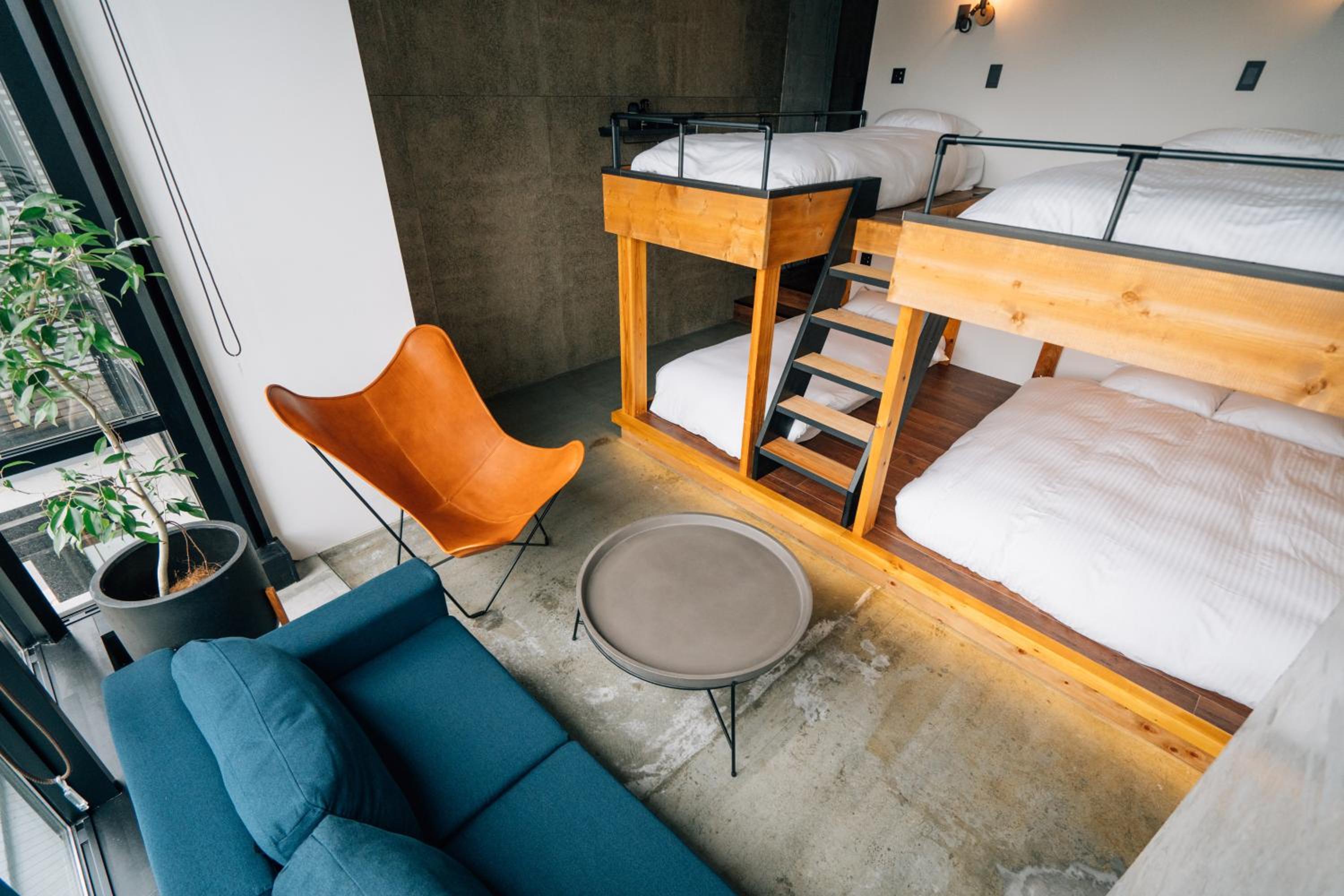 Deluxe Room with Shower and River View (2 Double Beds and 2 Single Beds) - Non-Smoking - No Cleaning for Consecutive Night Stays - Photo 1
