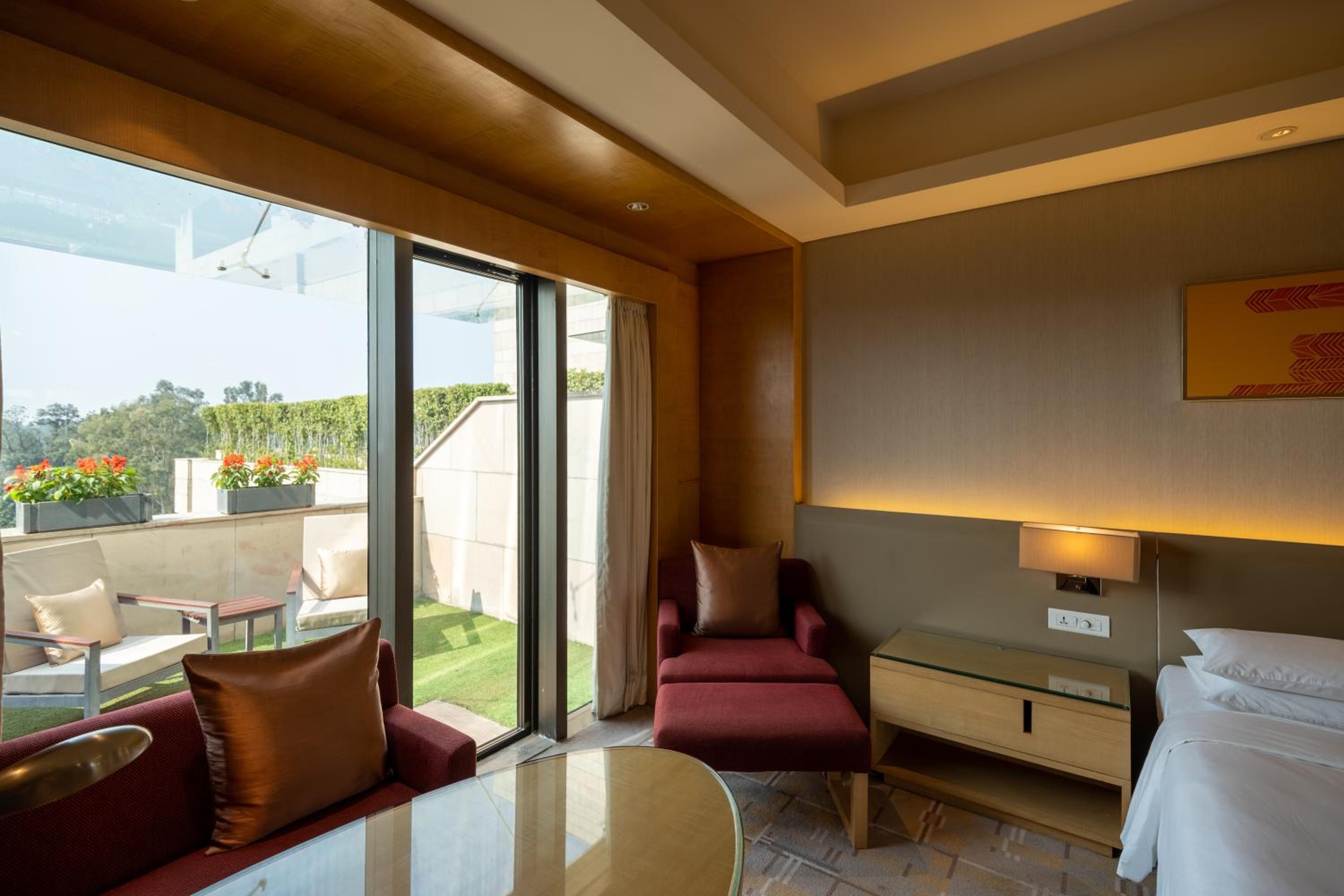 King Bed Pool View, Balcony with Bathtub & Club Access with Unlimited Complimentary IMFL beverages from 18:00 HRS to 20:00 HRS