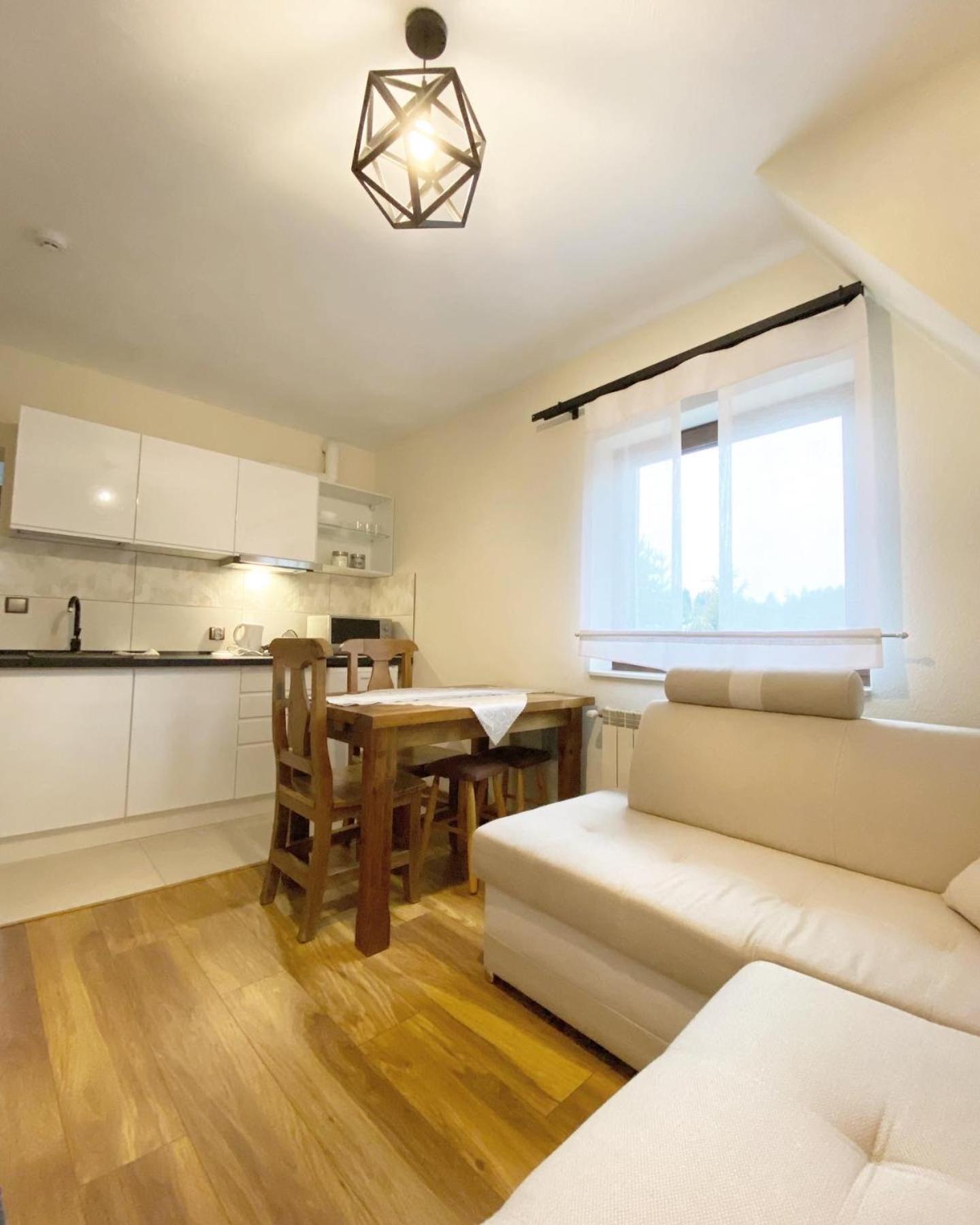 Apartment with Balcony - Photo 2