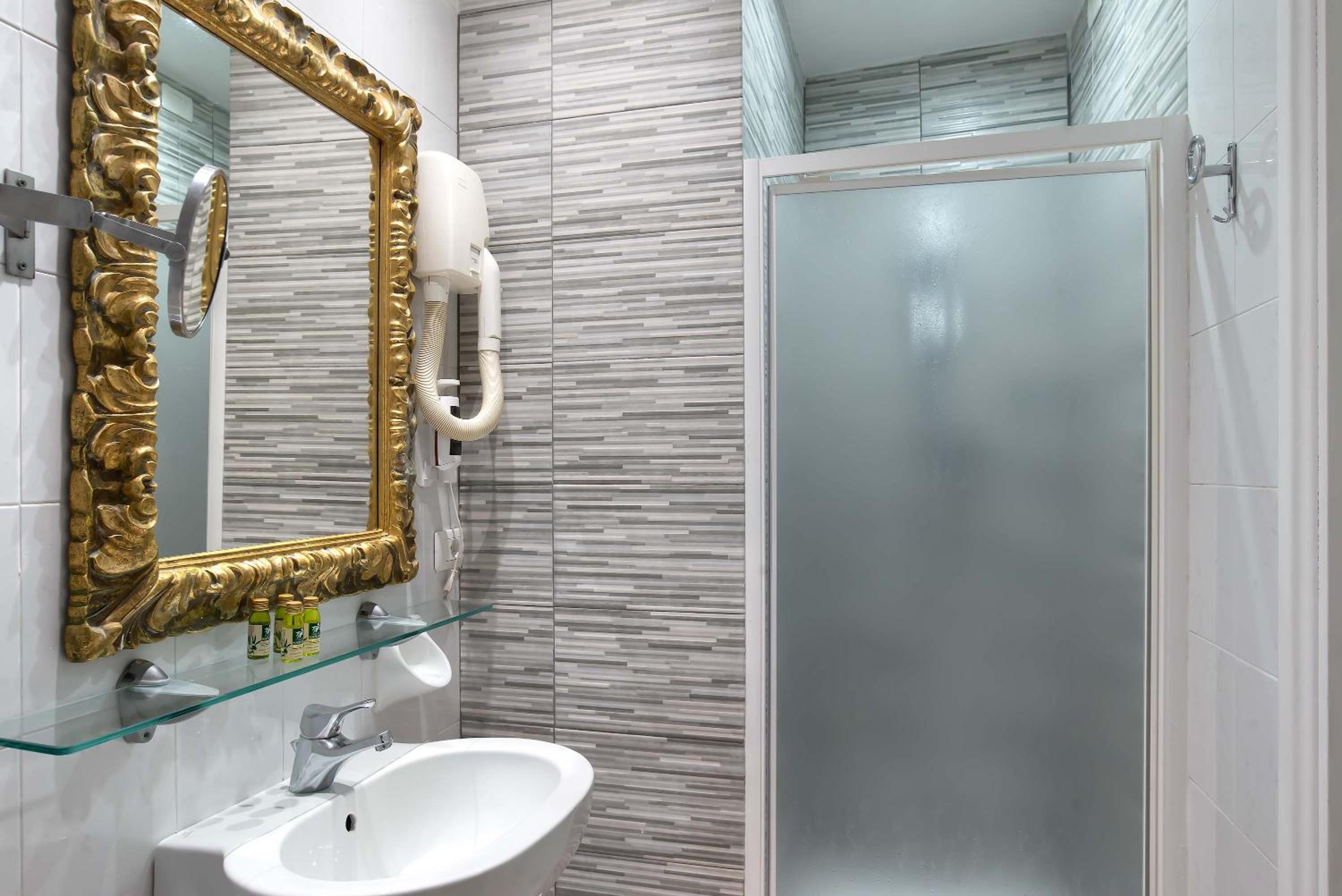 Relax in this stylishly designed bathroom retreat.