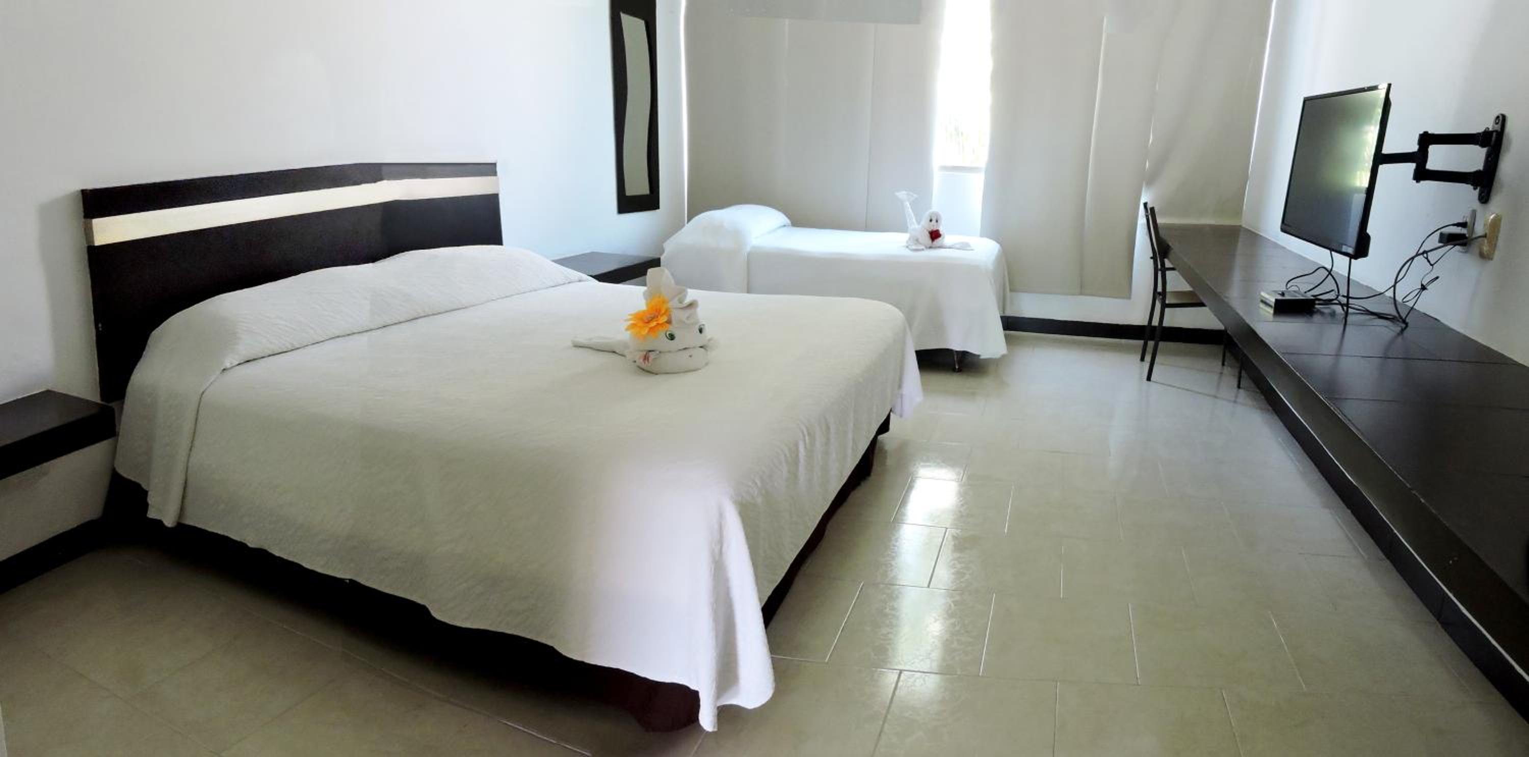 Standard Triple Room - Photo 1
