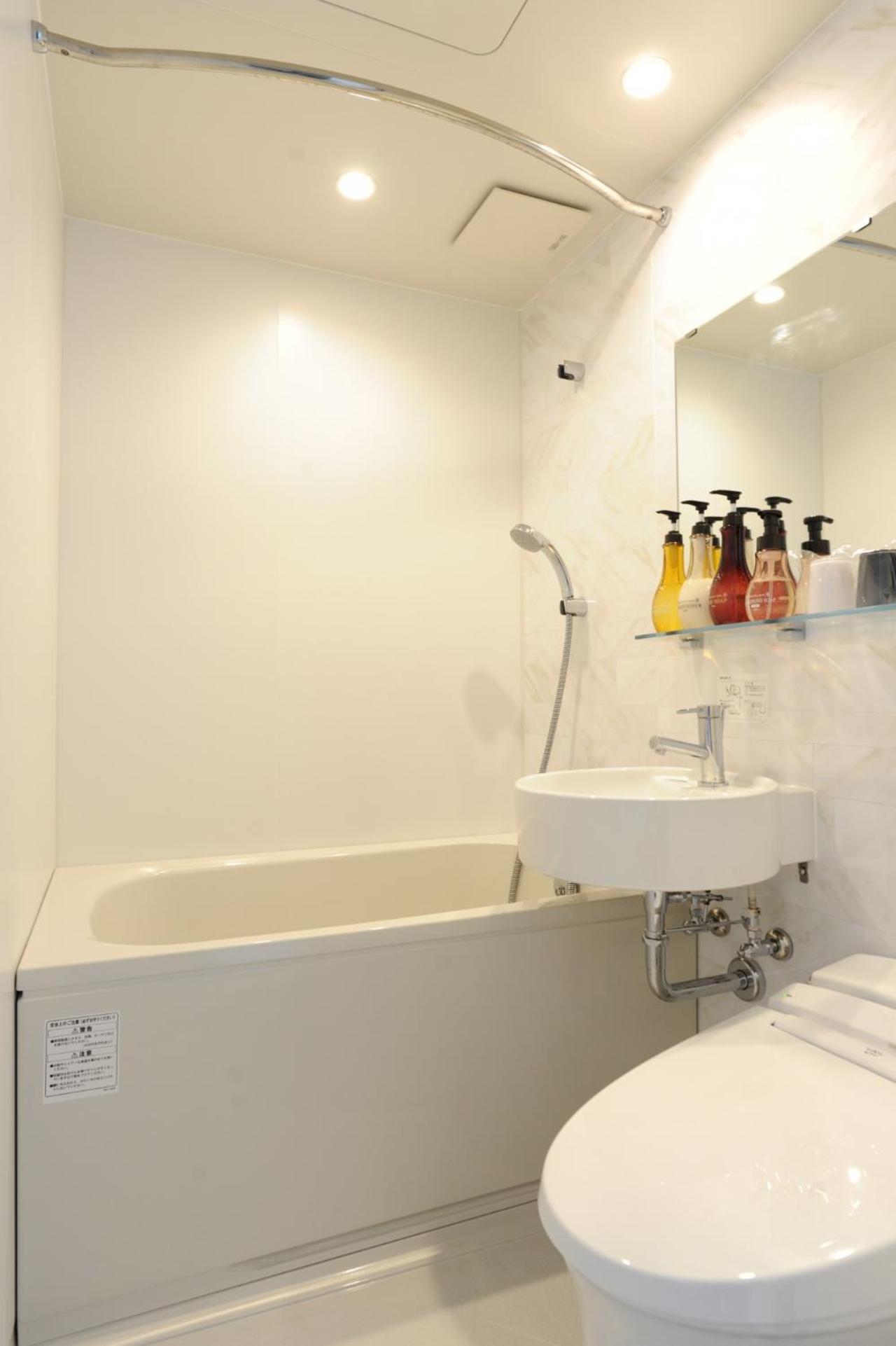 Standard Twin Room - Photo 11