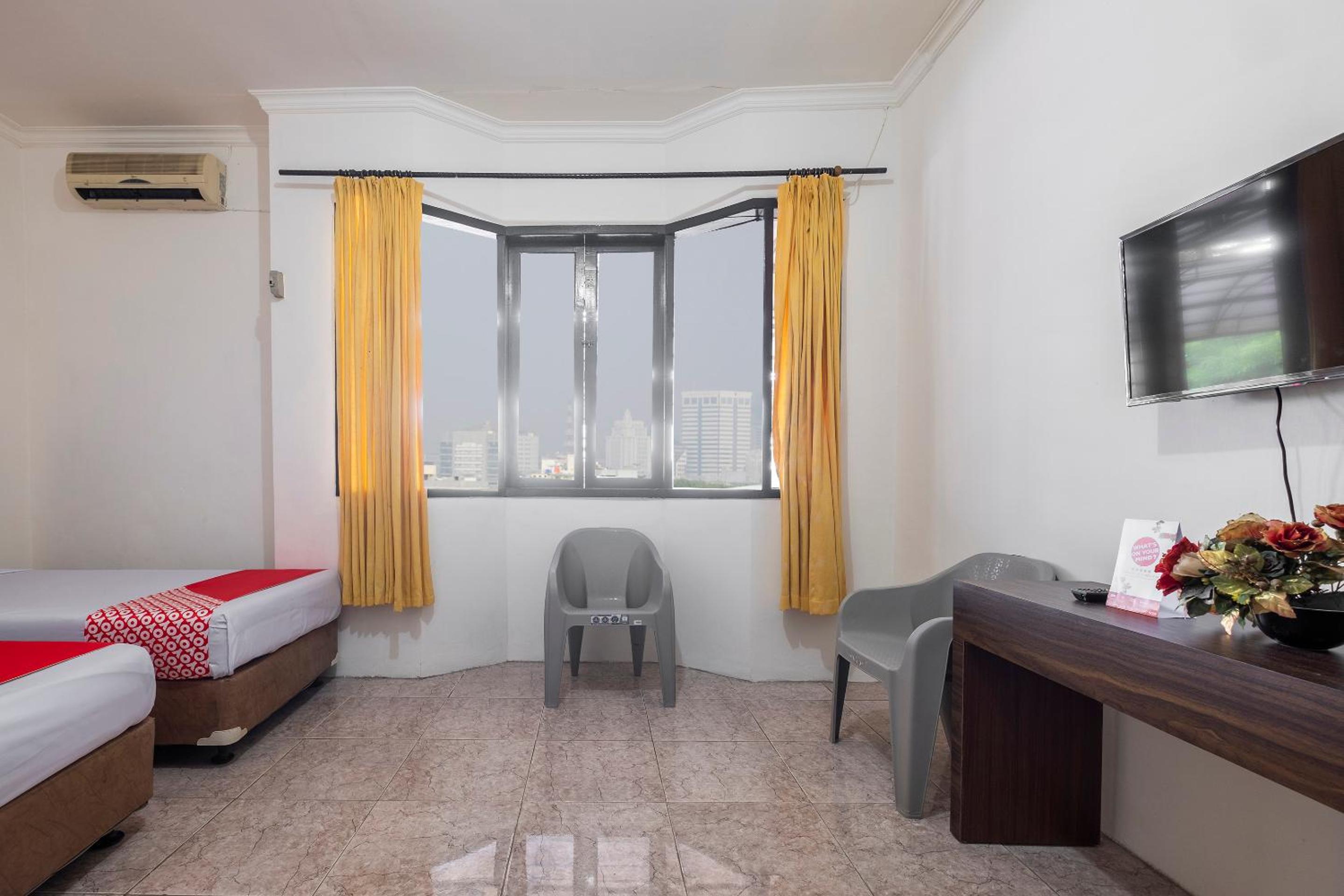Standard Twin Room - Photo 4