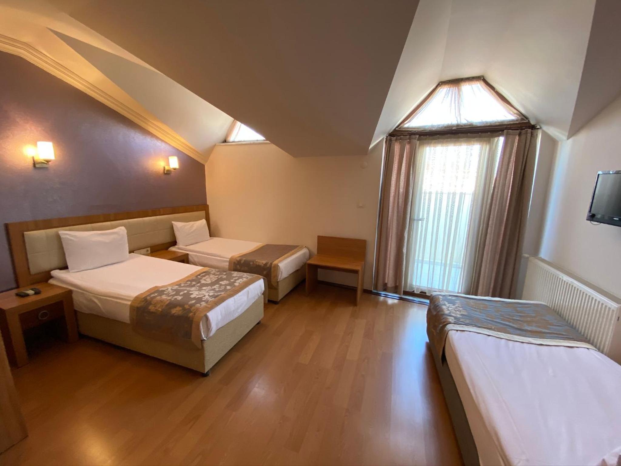 Superior Triple Room - Photo 8