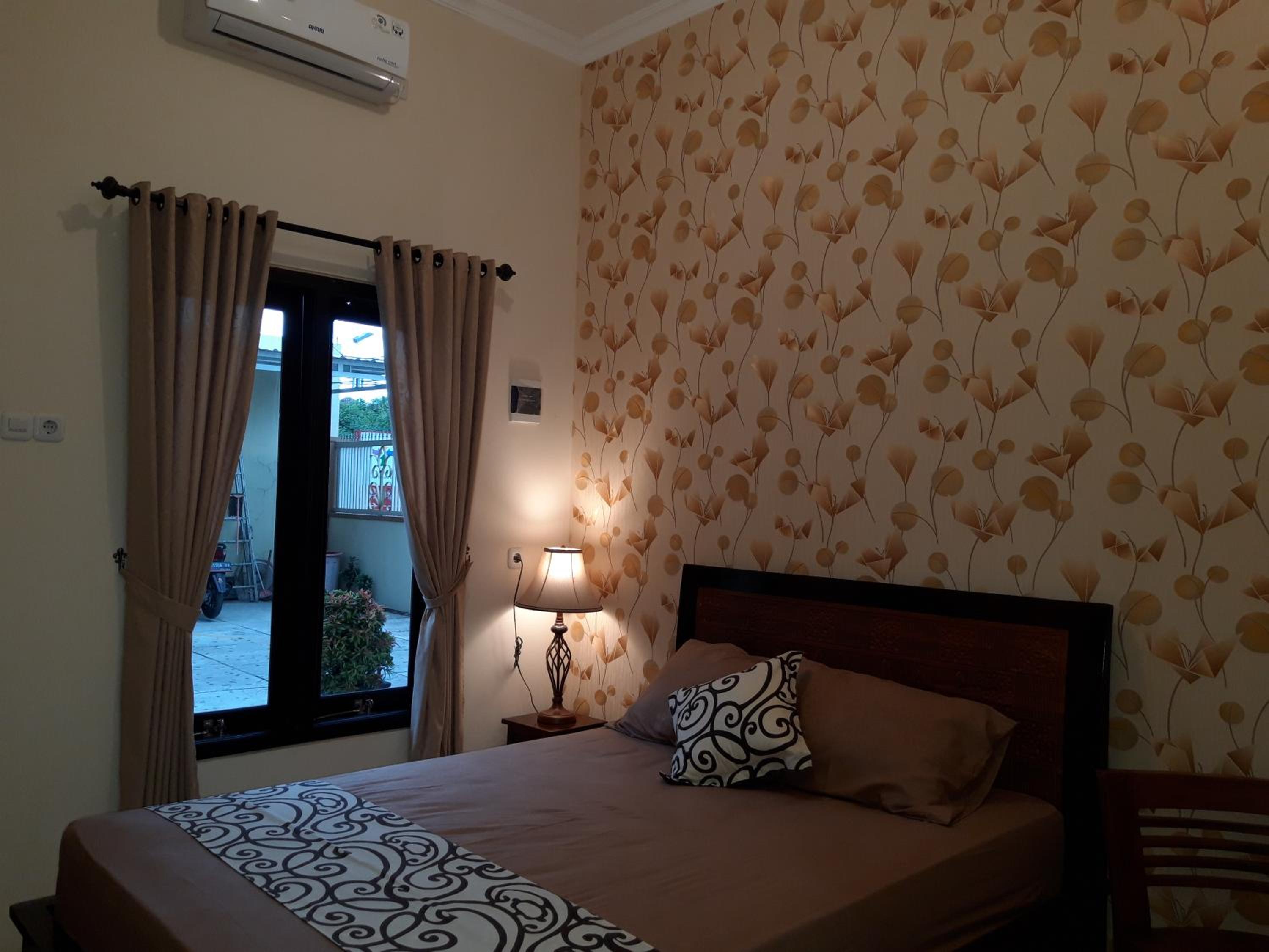 Deluxe Room - Photo 1