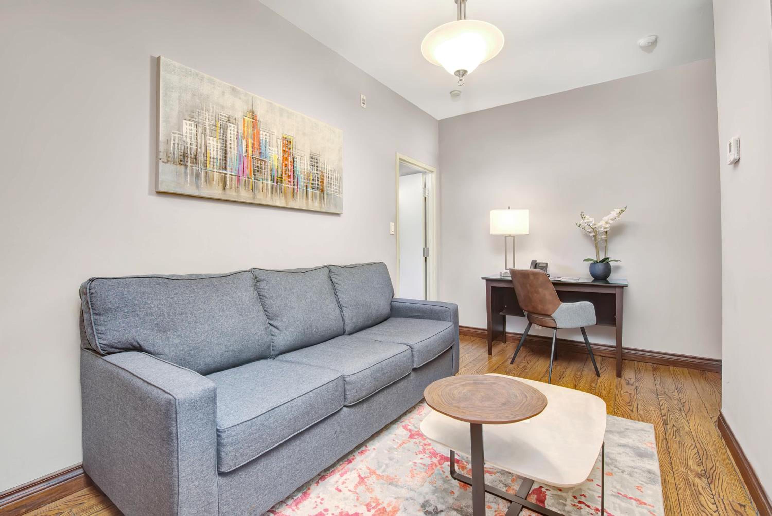 One-Bedroom Queen Suite with Sofa Bed - Photo 2
