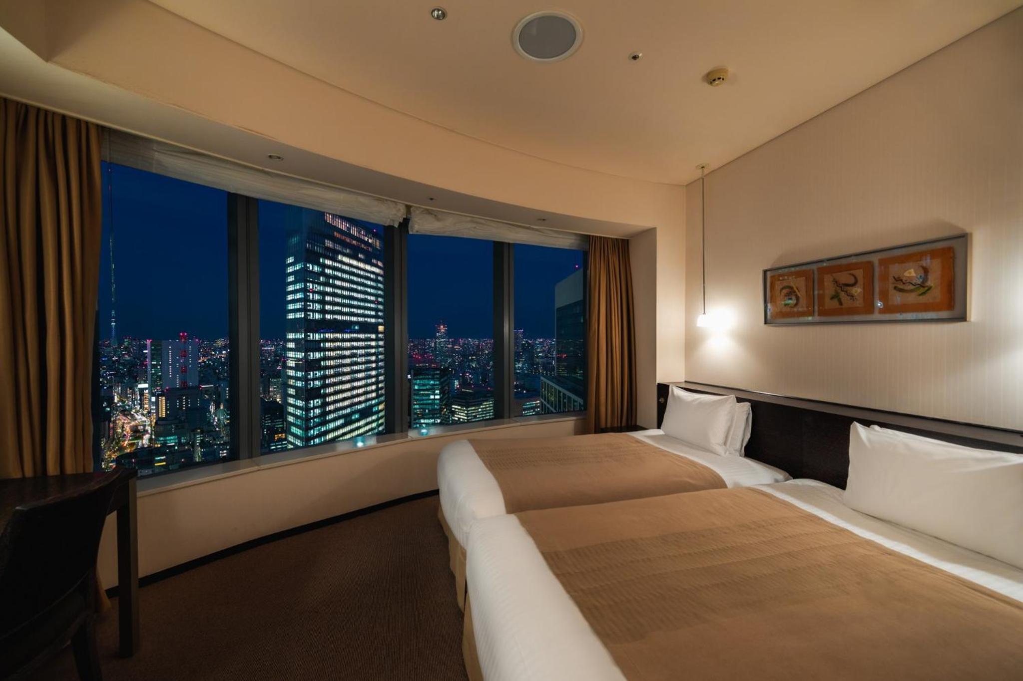 Deluxe Triple Room with 2 Single Beds and 1 Sofa Bed - Non Smoking - Above 26th floor