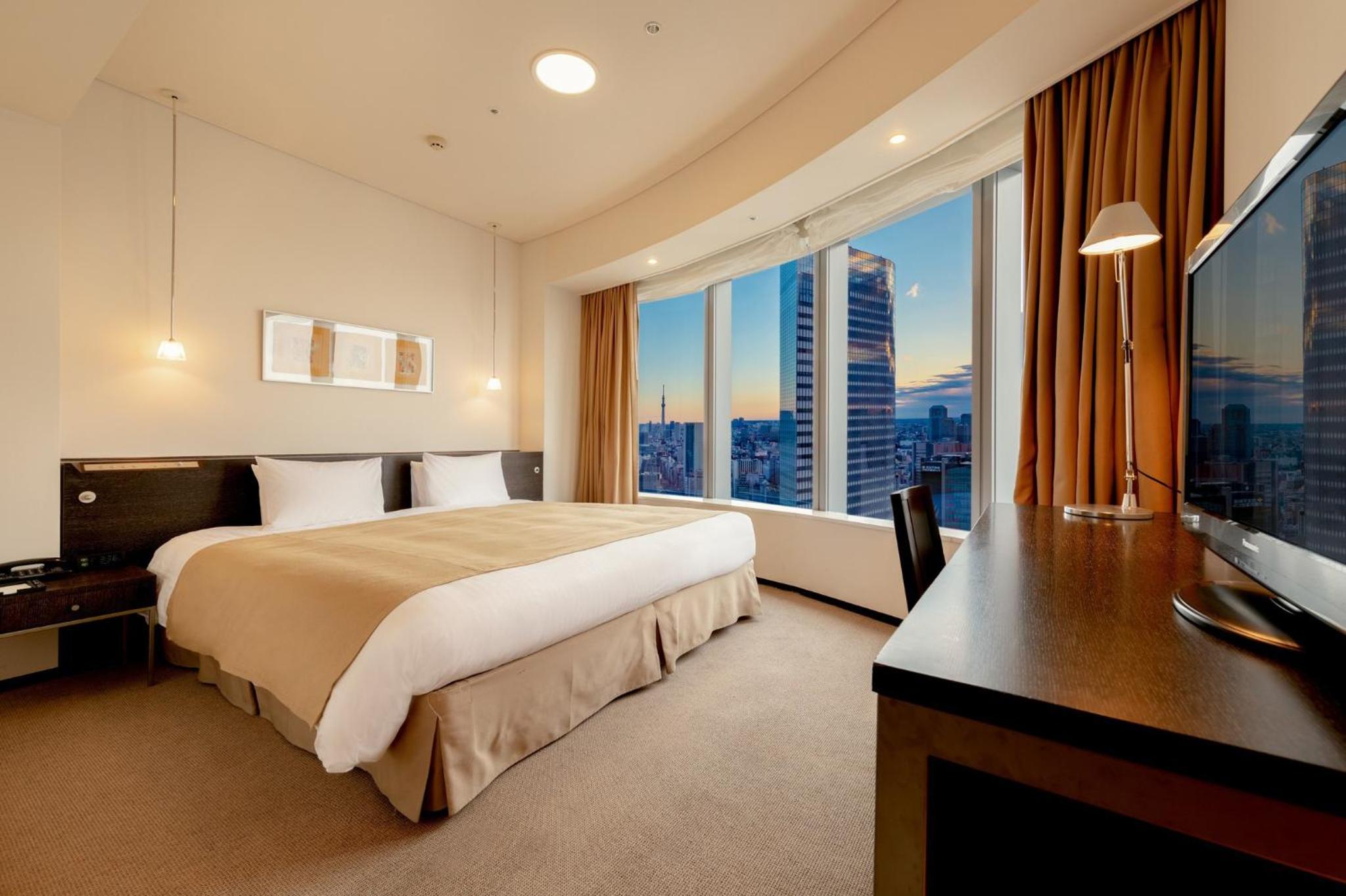 Deluxe Triple Room With 1 King Bed And 1 Sofa Bed - Non Smoking - Above 27th Floor