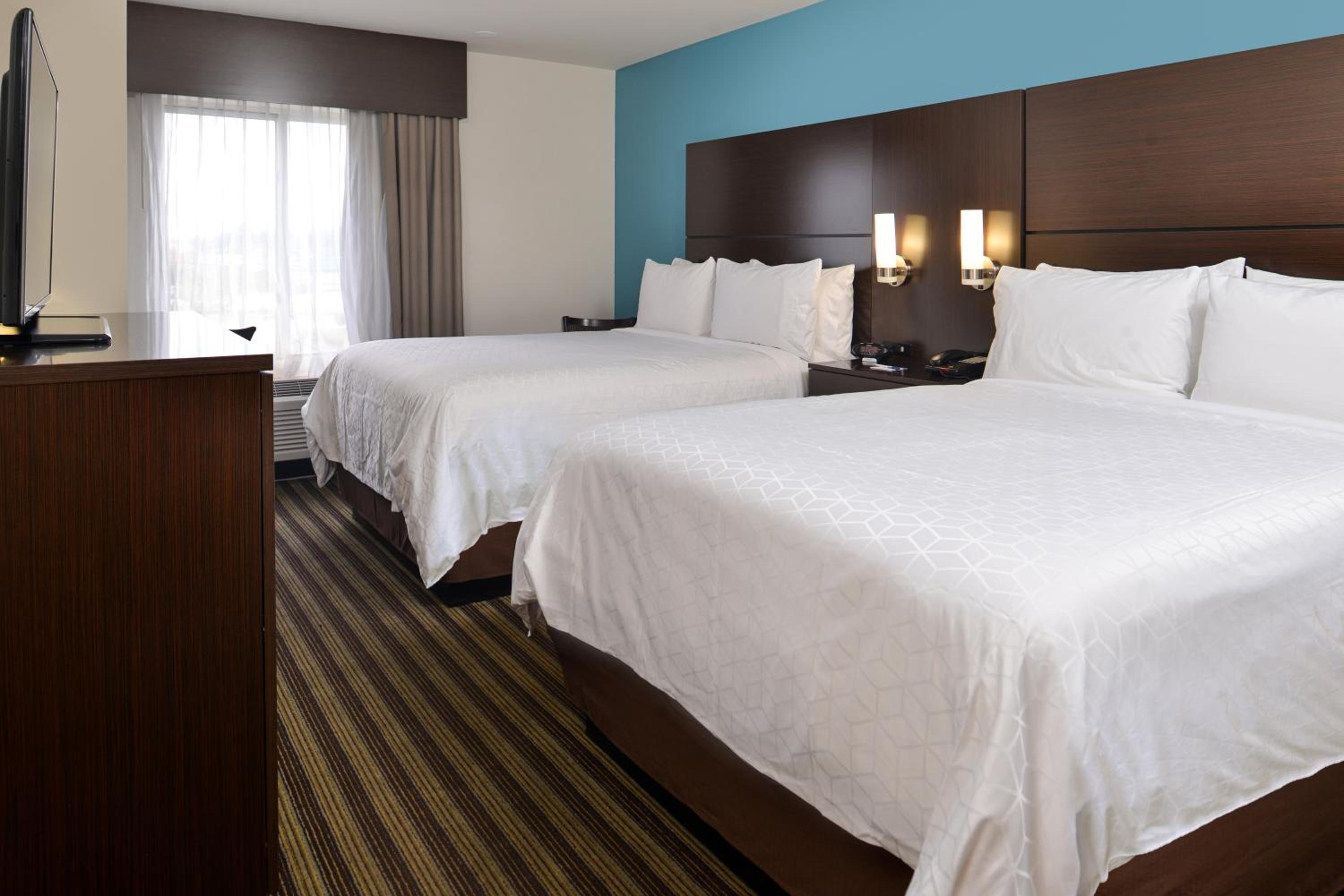 Standard Queen Room with Two Queen Beds and Bath/Shower - Photo 1
