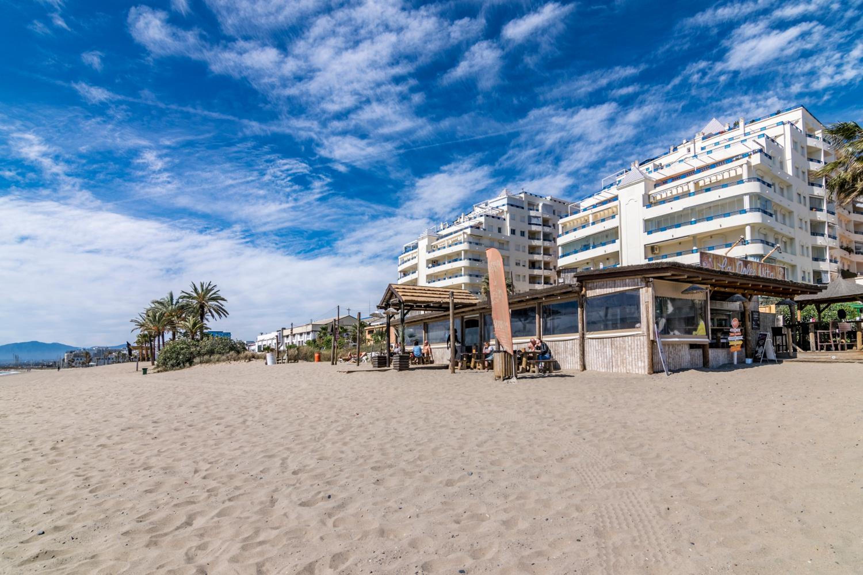 Three-Bedroom Apartment with Lateral Sea Views