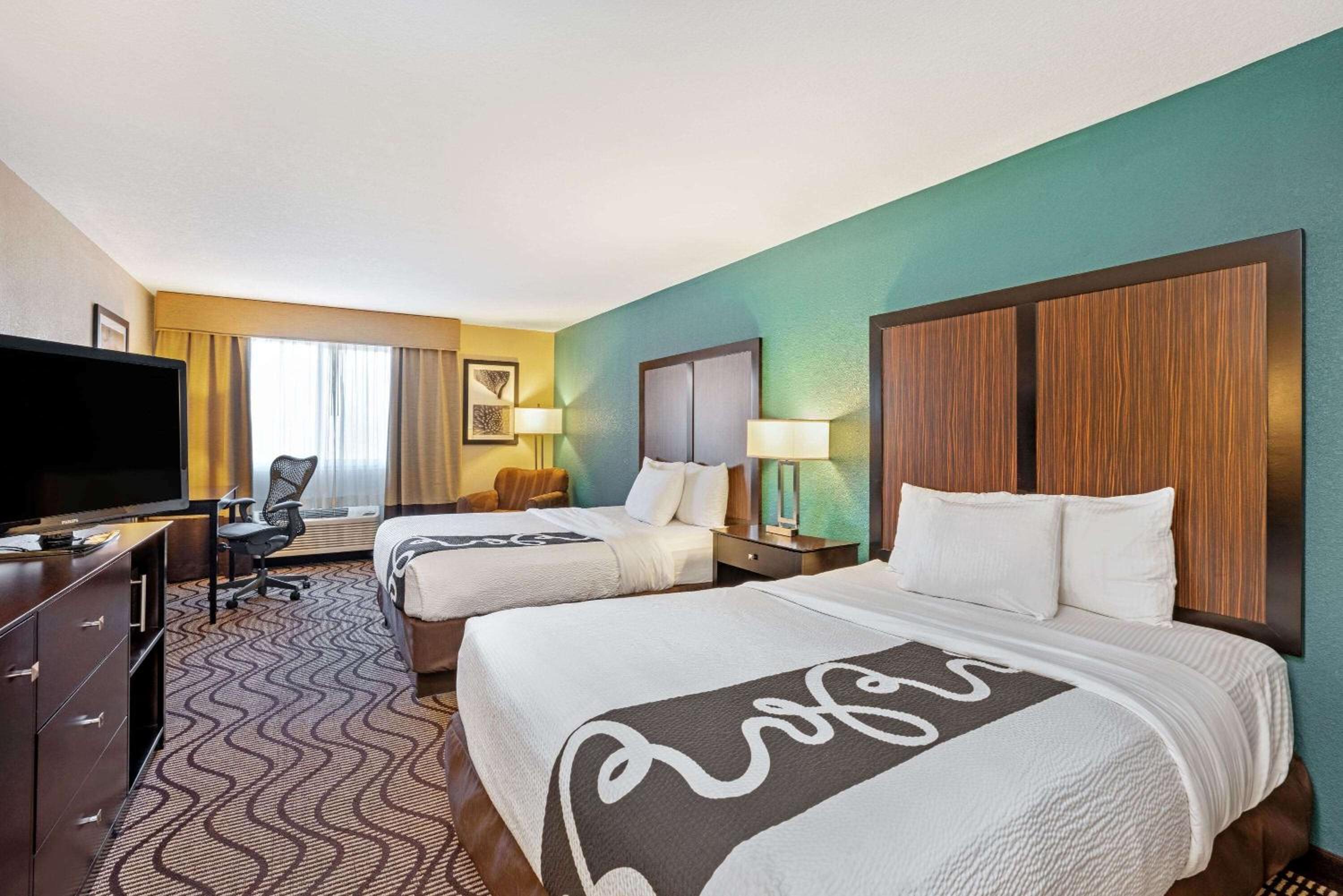 Deluxe Queen Room with Two Queen Beds - Photo 1