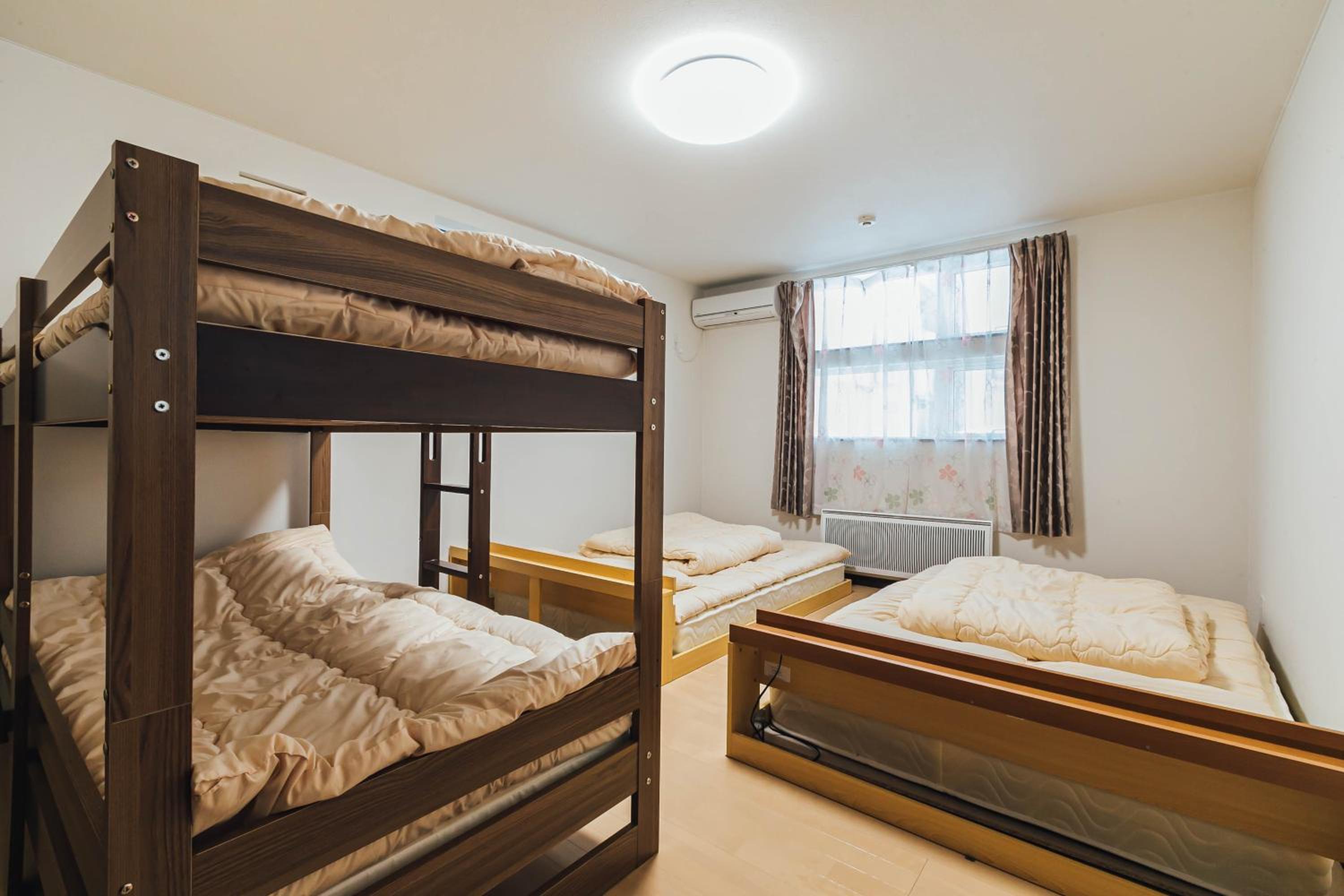 Three-Bedroom House - Photo 19