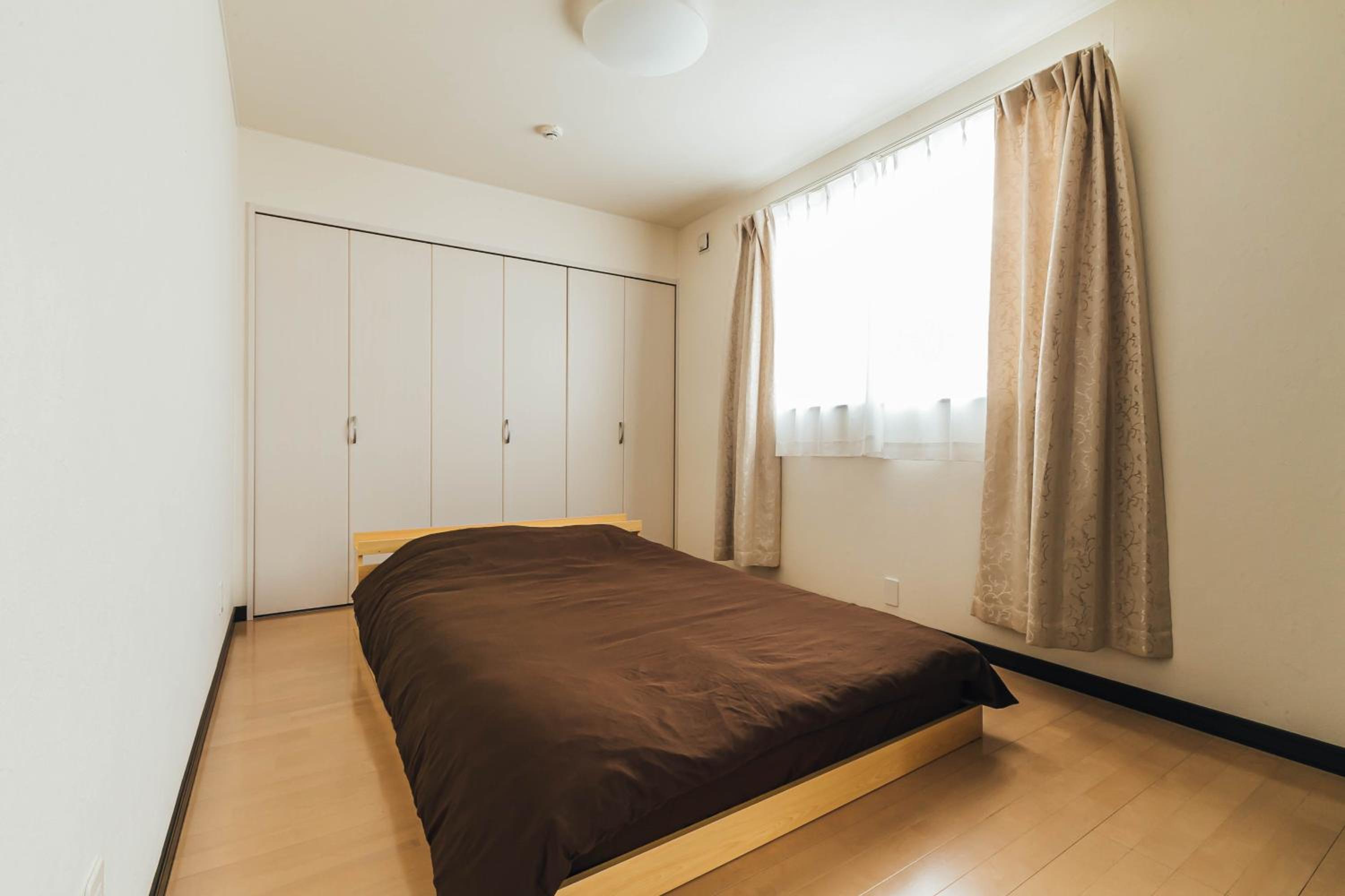 Three-Bedroom House - Photo 24