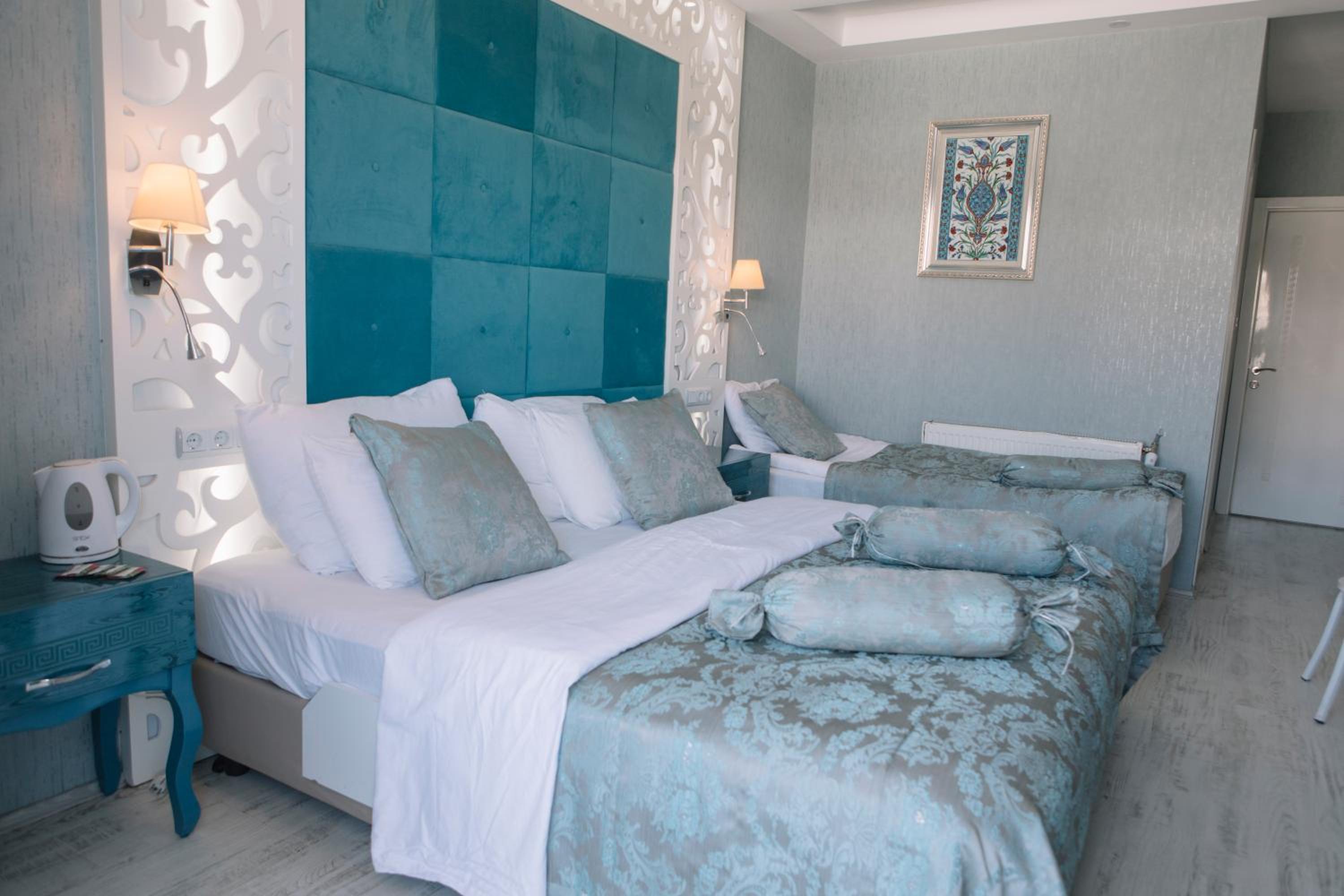 Comfort Triple Room with Travertine View photo 1