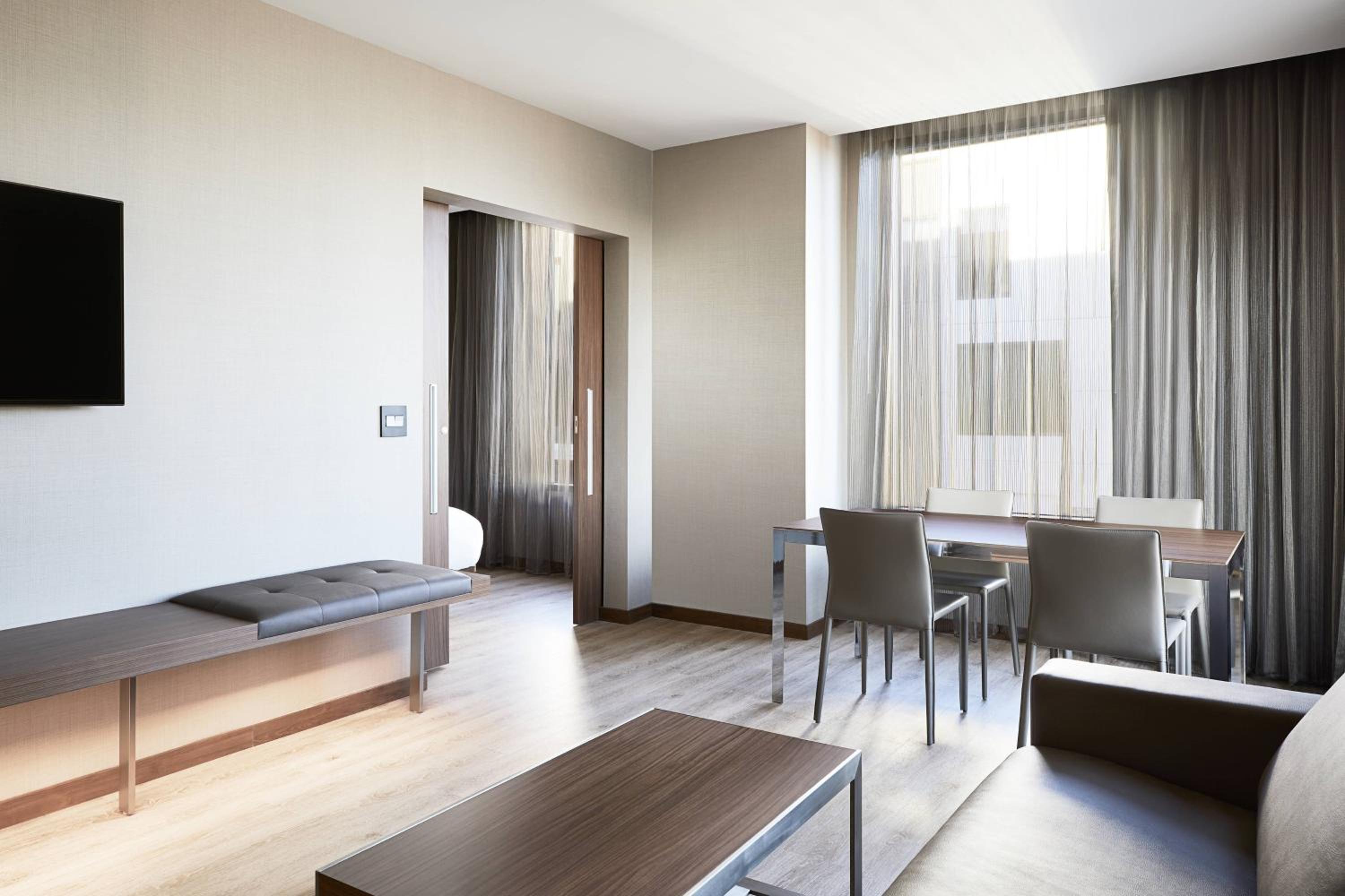 One-Bedroom King Suite with Courtyard View and Sofa Bed