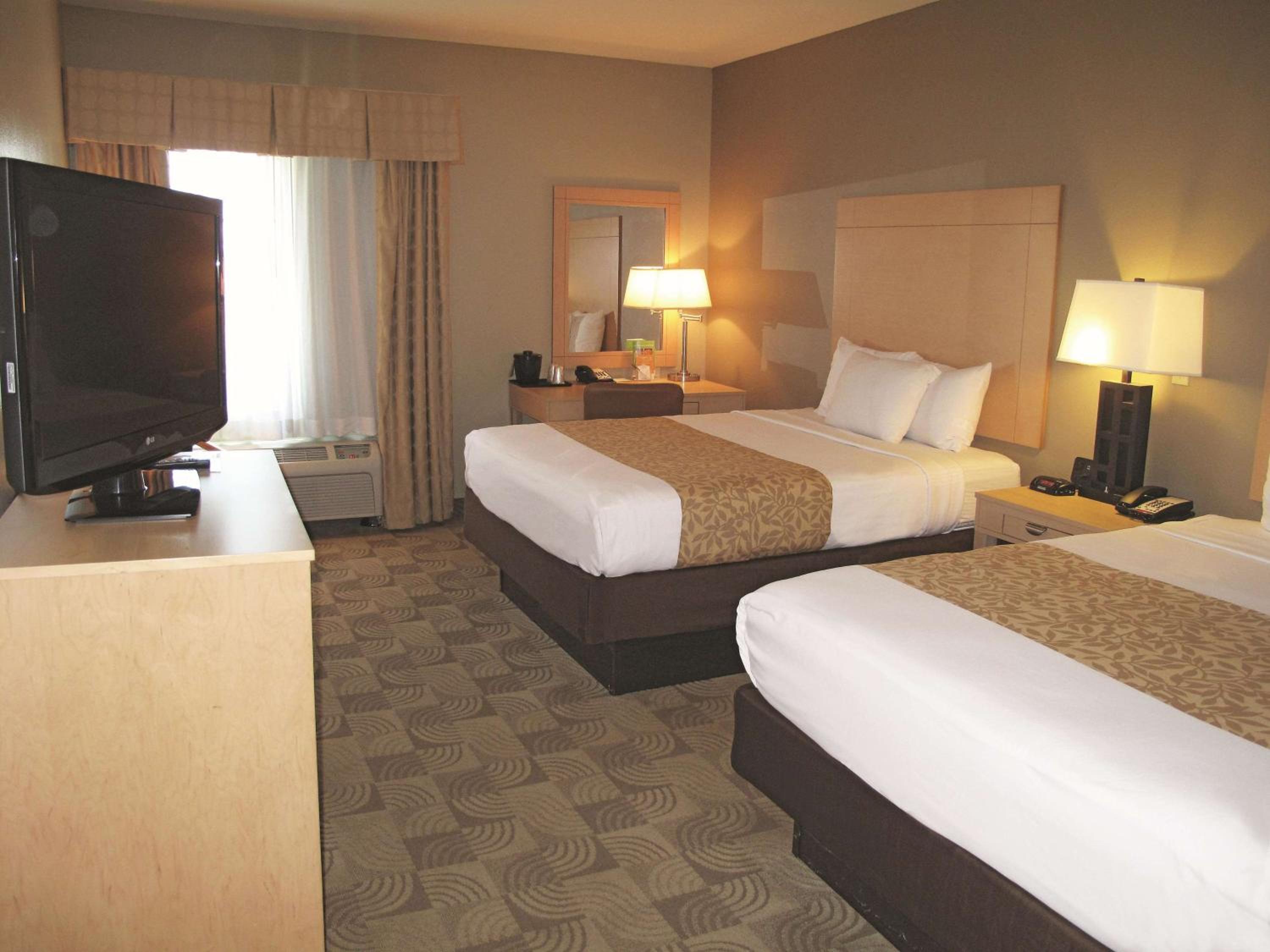Queen Room with Two Queen Beds - Photo 1