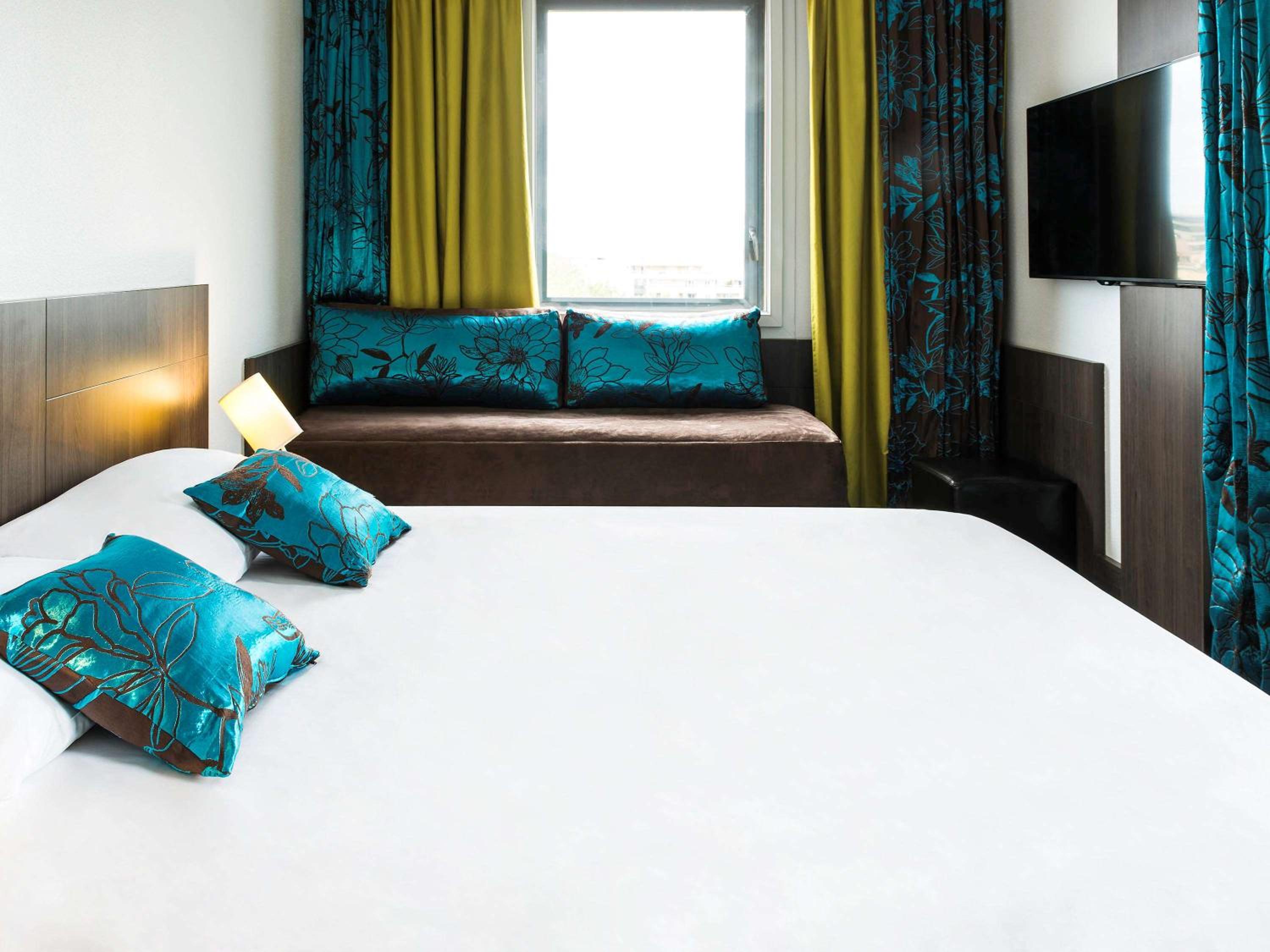 Superior Room One Queen Bed and One Sofa Bed
