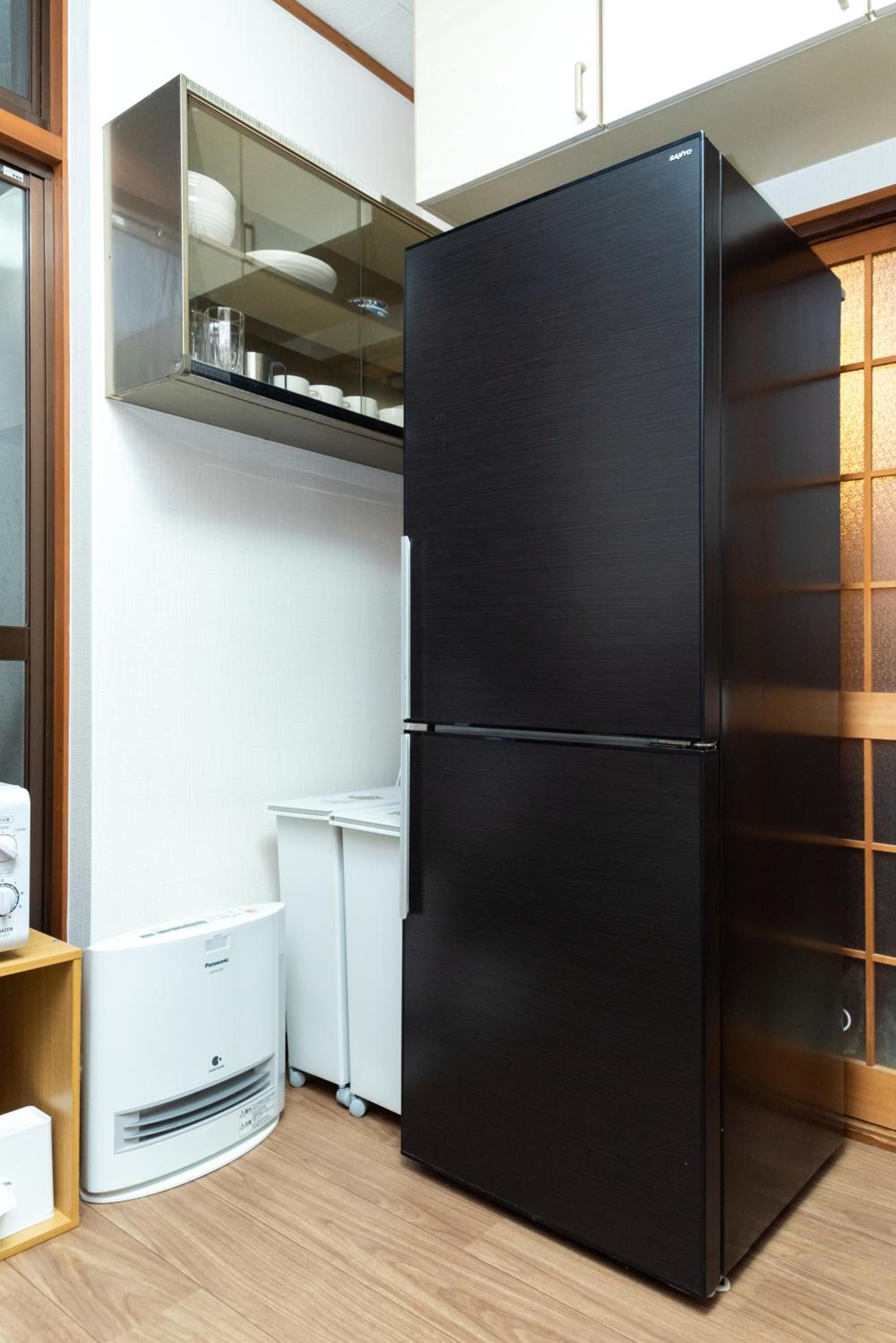 Three-Bedroom House - Photo 14