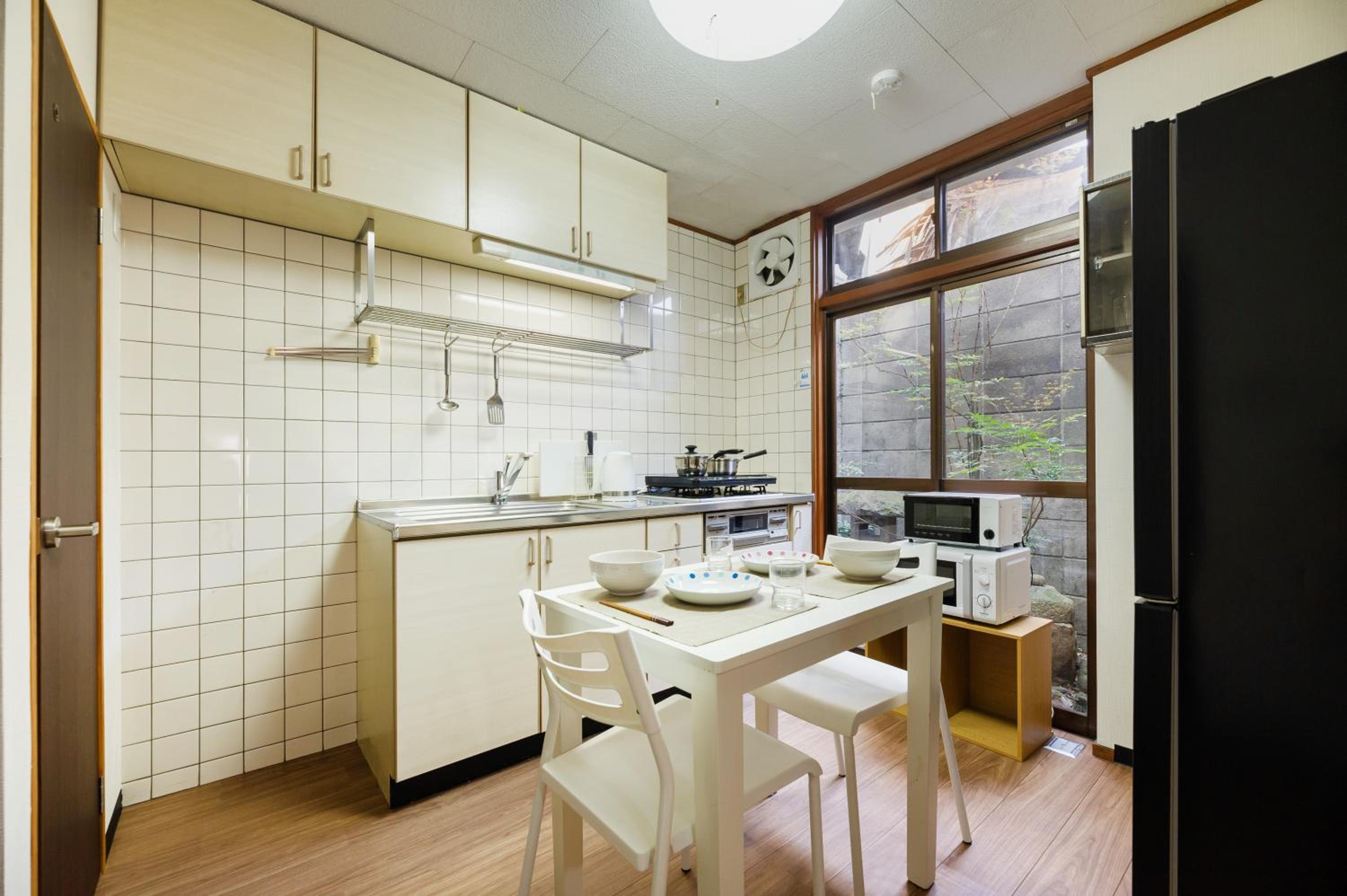 Three-Bedroom House - Photo 12