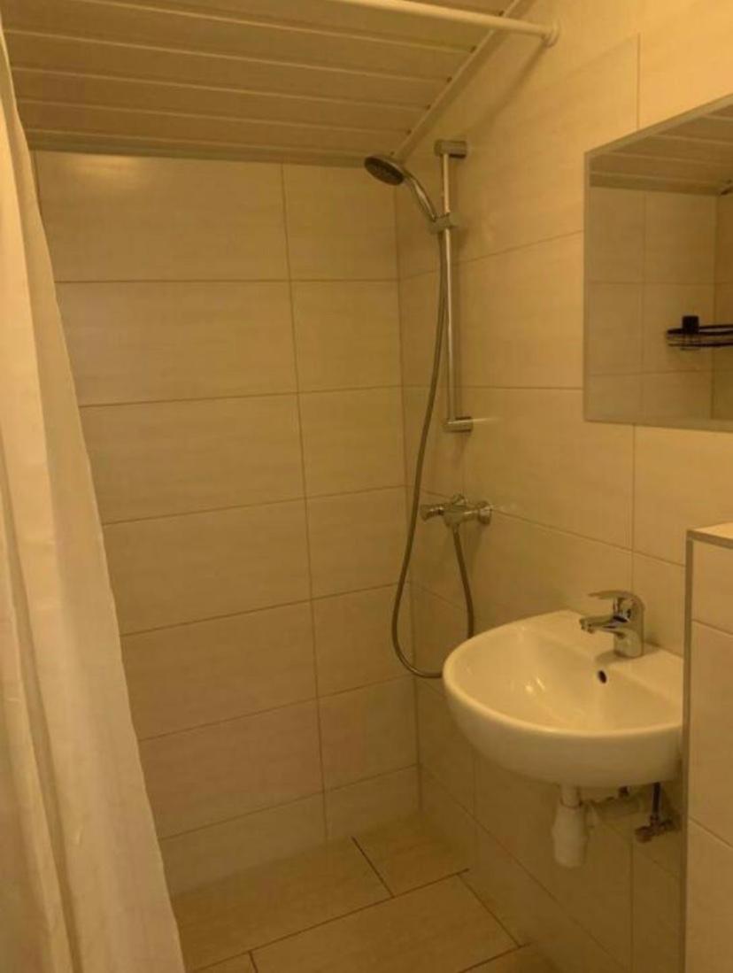 Three-Bedroom Apartment - Photo 10