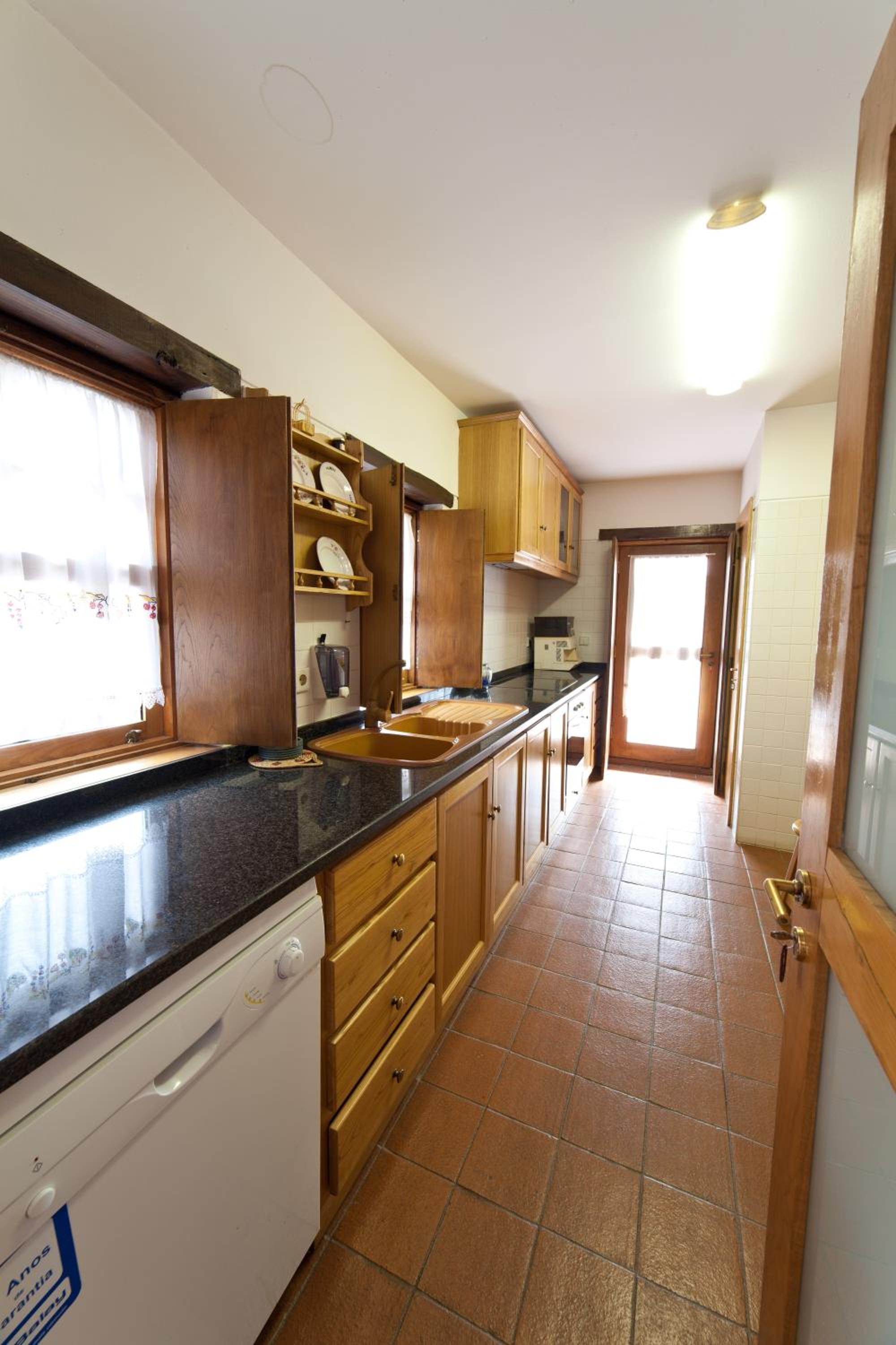 Three-Bedroom House - Photo 2