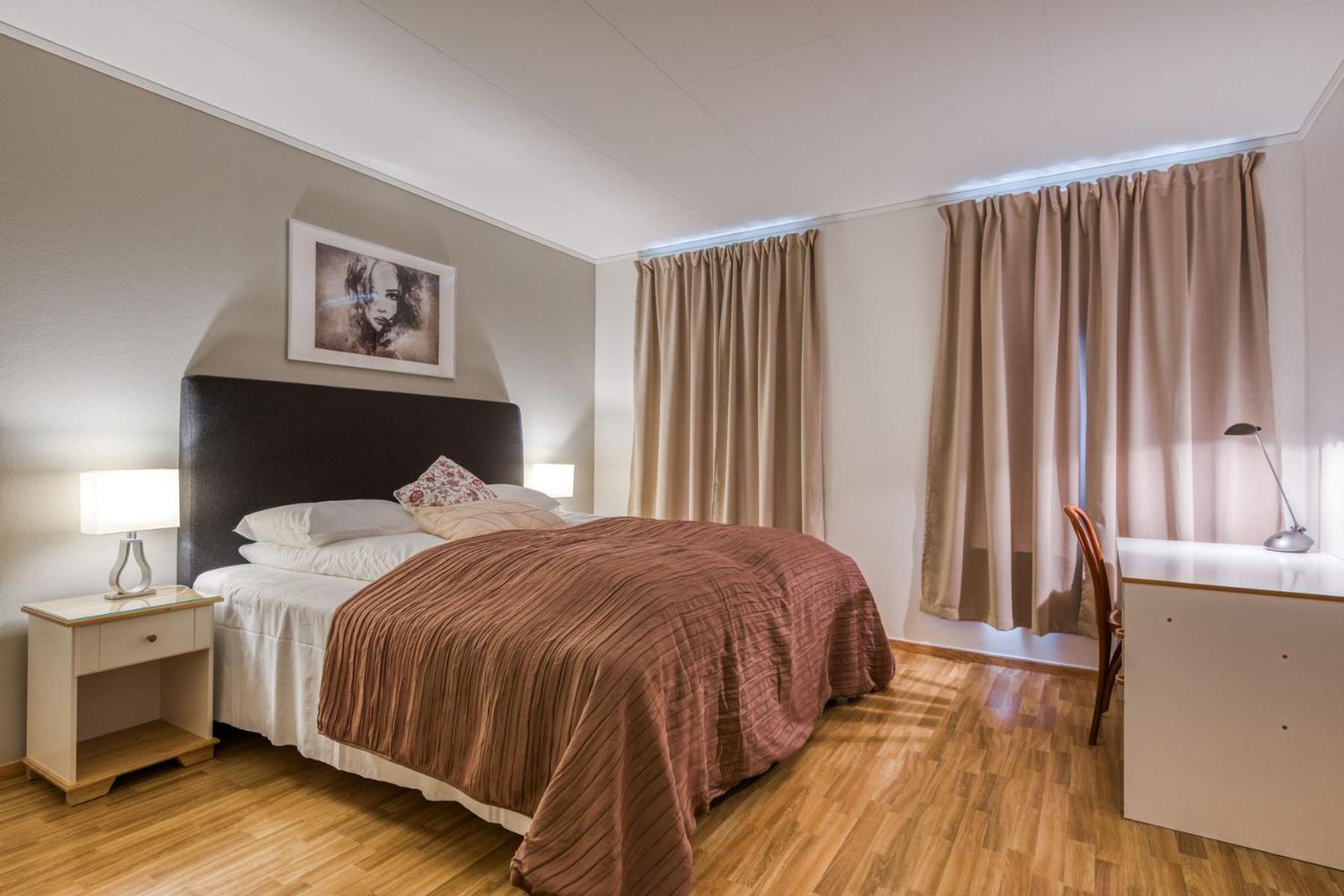 Three-Bedroom Apartment - Photo 6