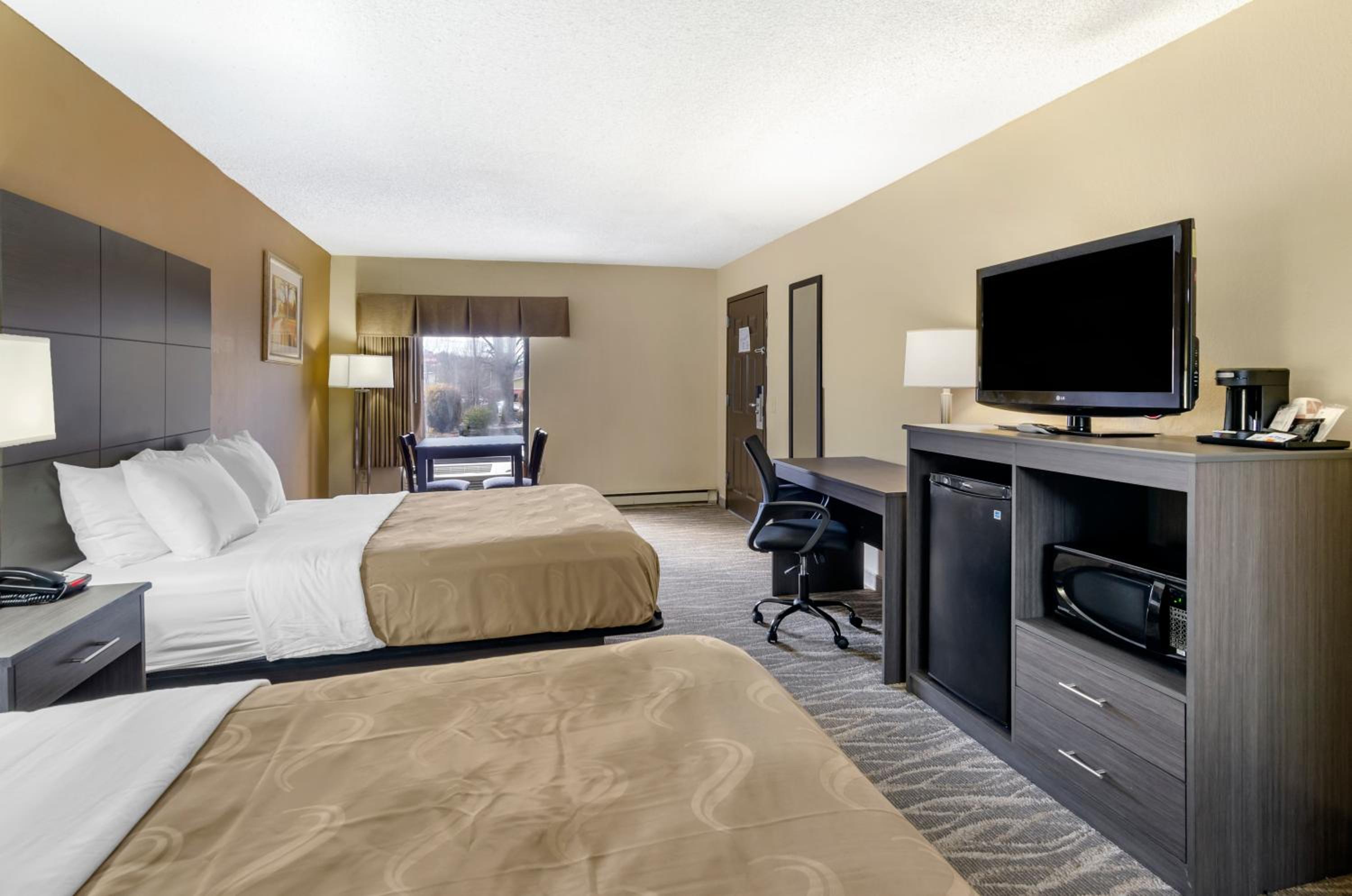 Queen Room with Two Queen Beds - Photo 1