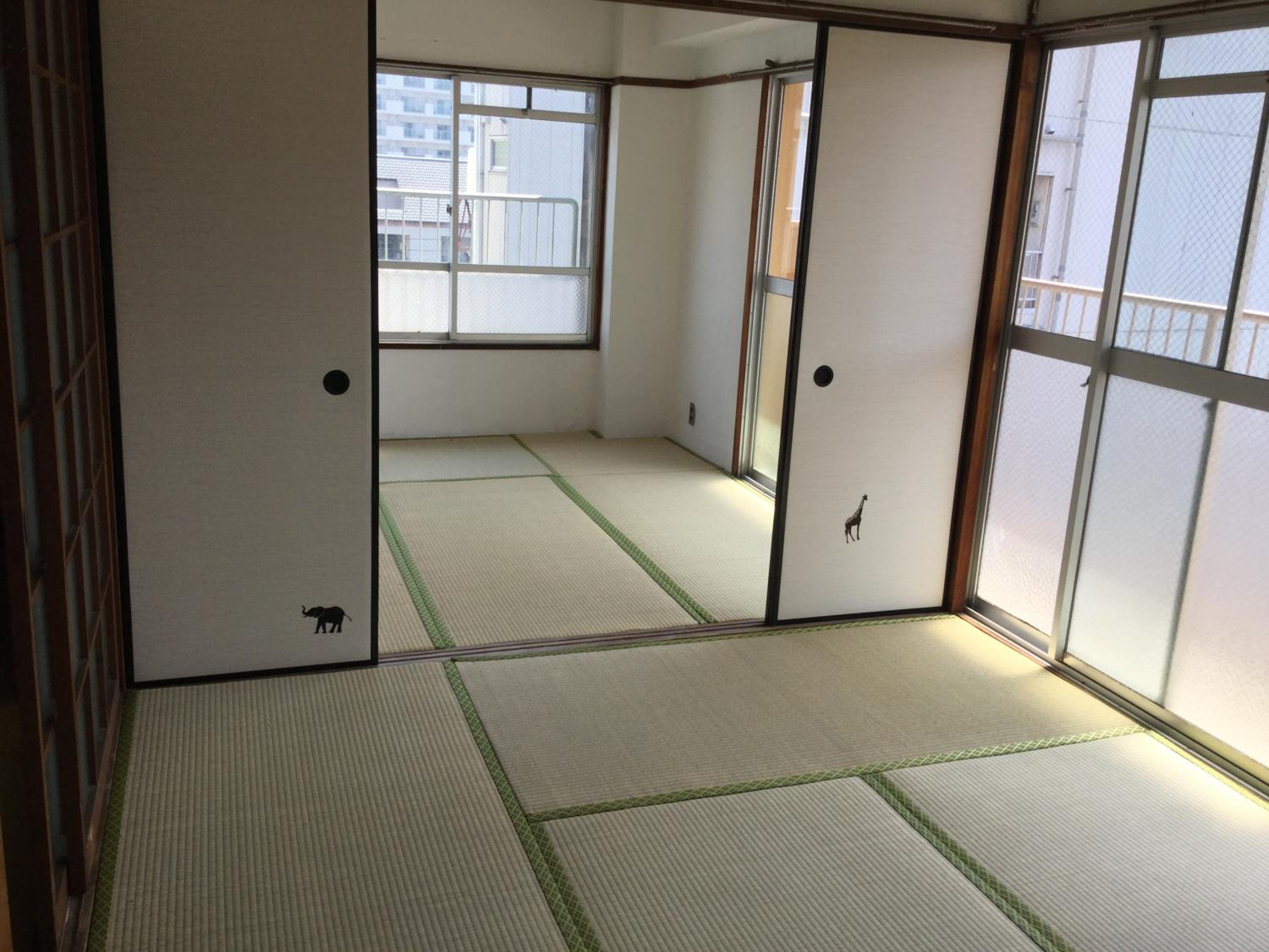 Three-Bedroom Apartment - Photo 2