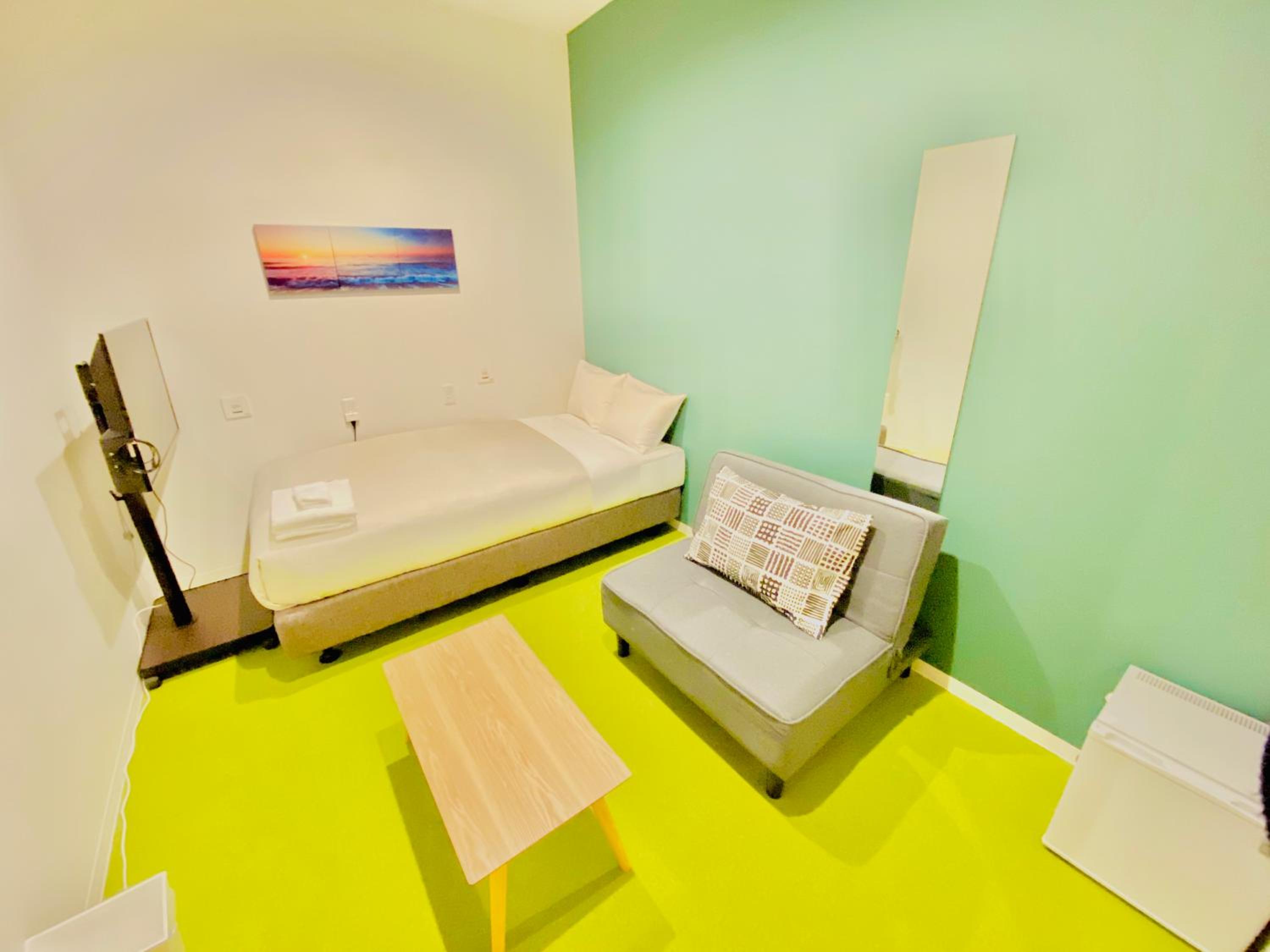 Executive Single Room with Sofa Bed - Female Only         photo 1
