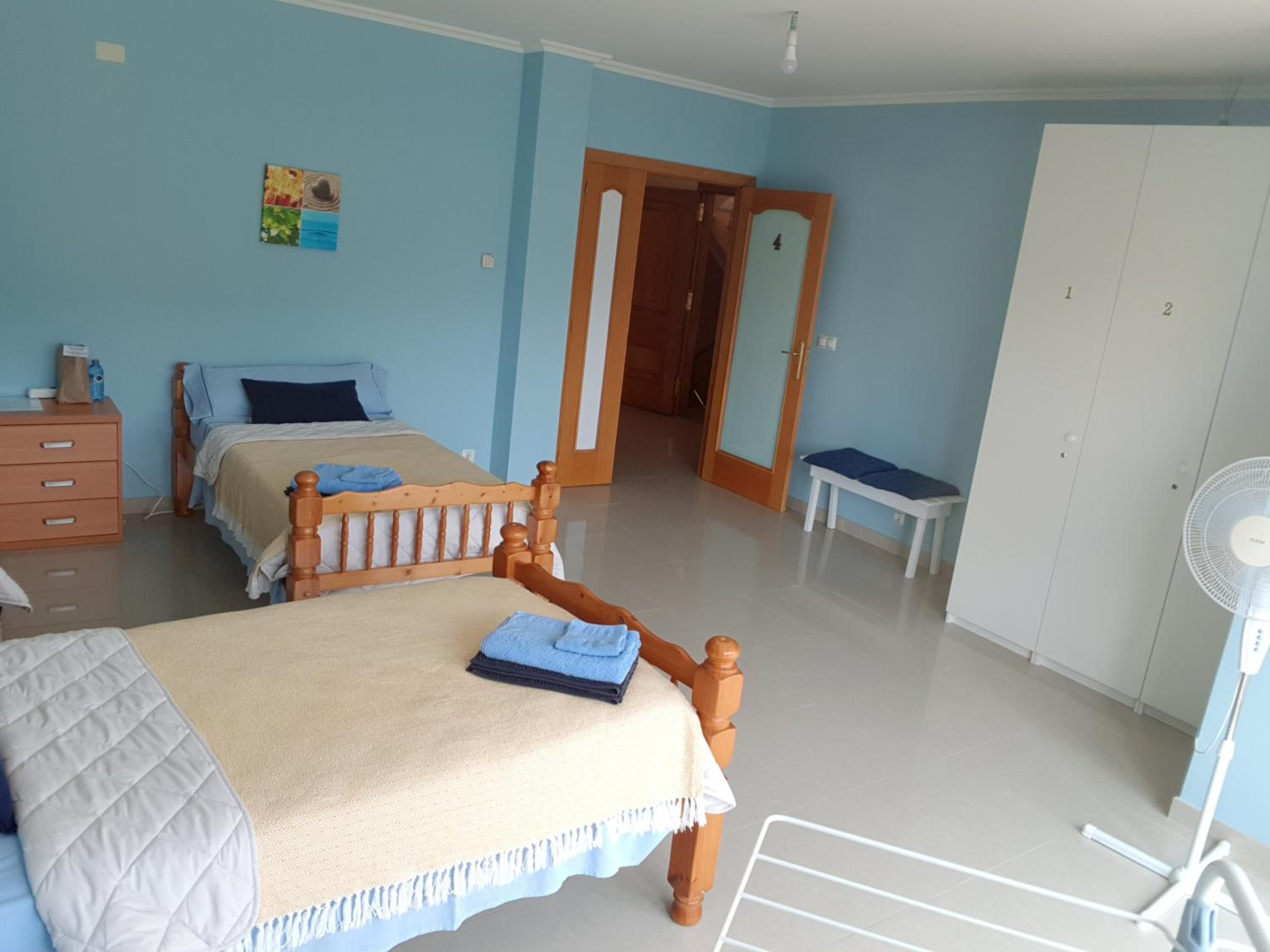 Habitación Triple Básica con Baño Compartido