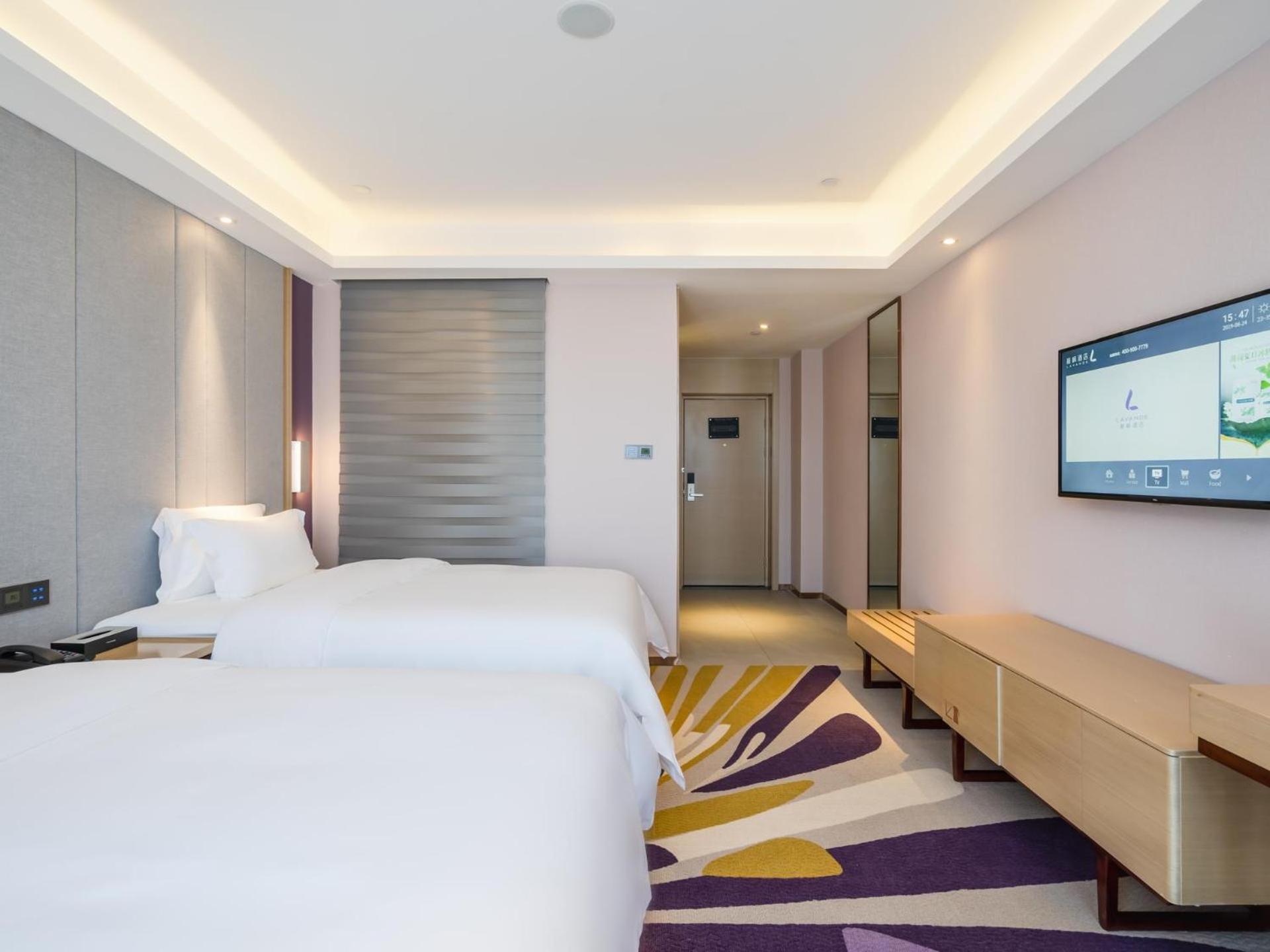 Deluxe Twin Bedroom - Photo 2