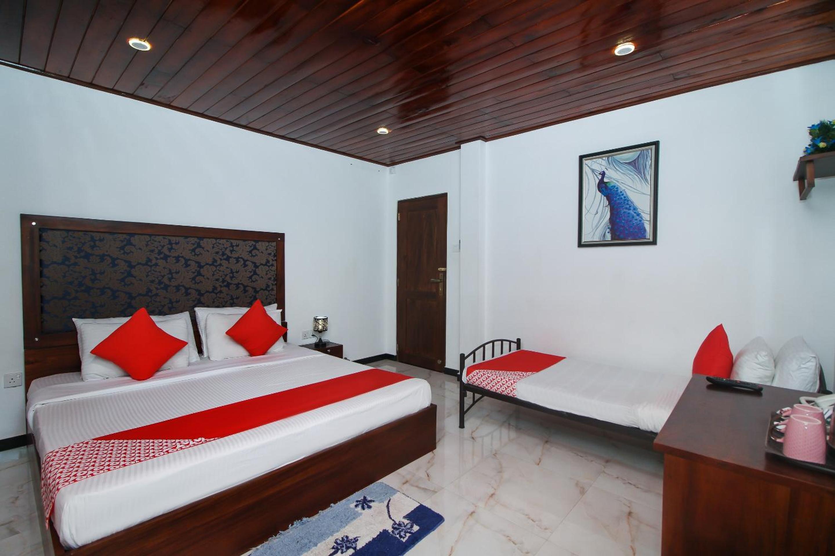Deluxe Triple Room - Photo 13
