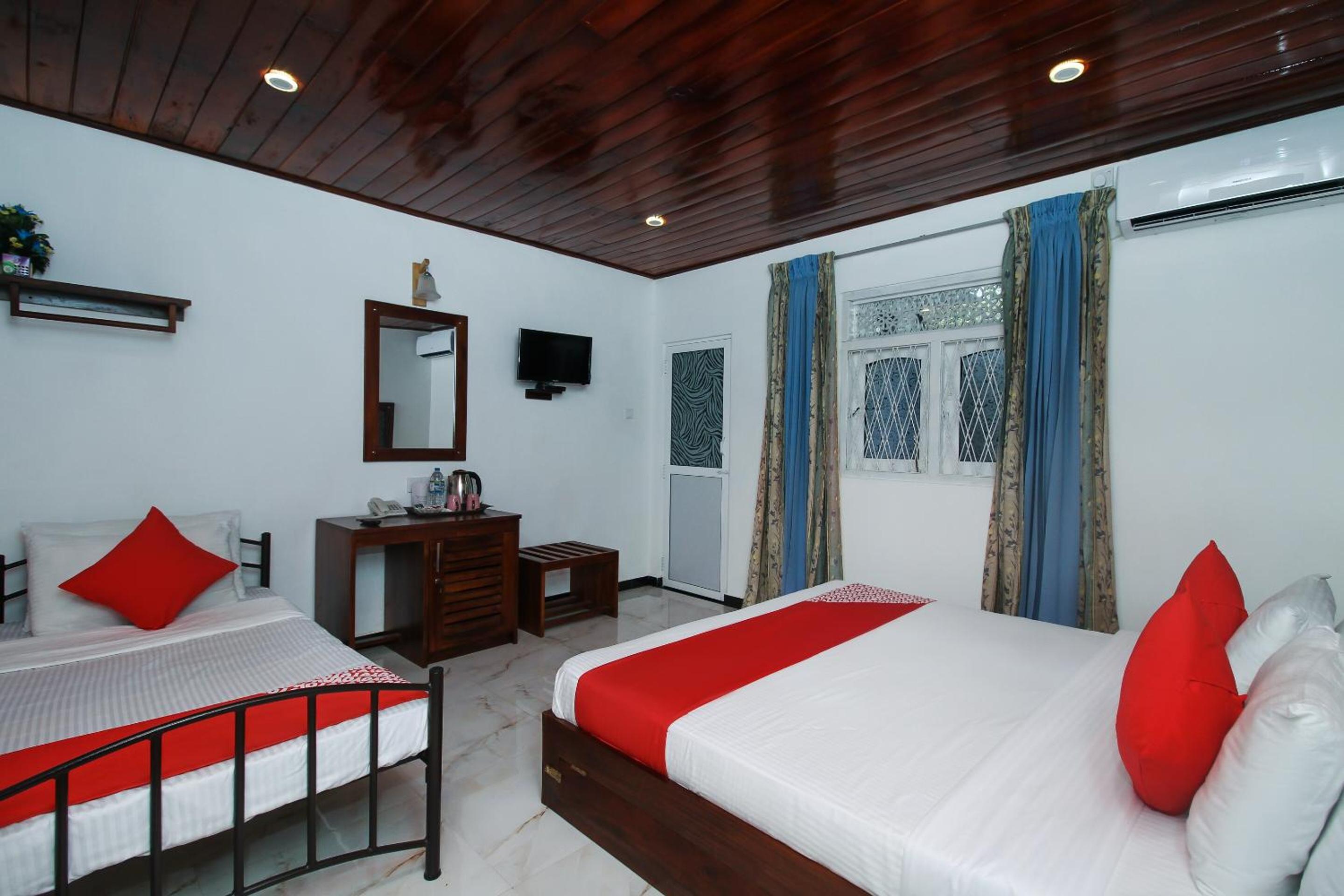 Deluxe Triple Room - Photo 8