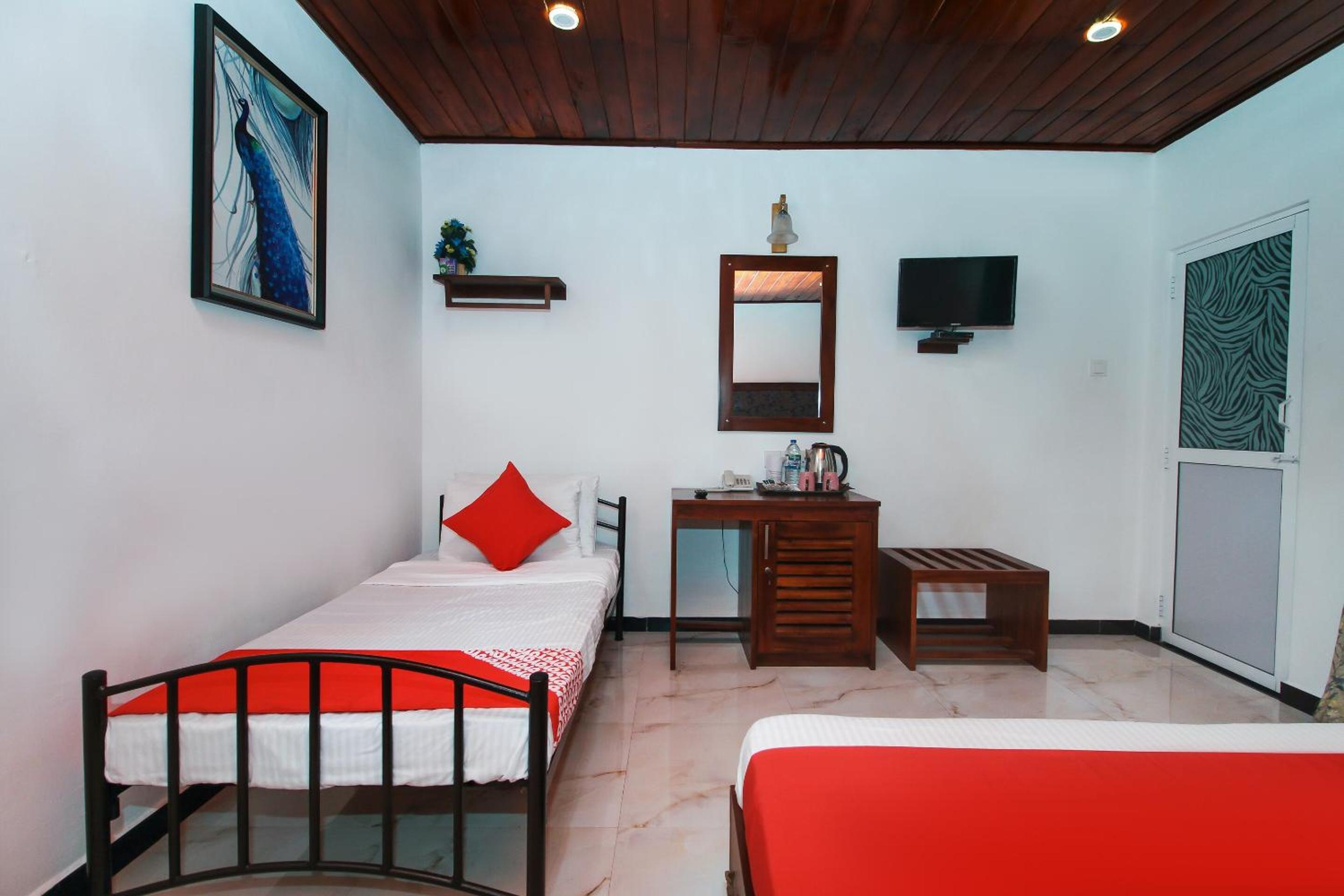 Deluxe Triple Room - Photo 9